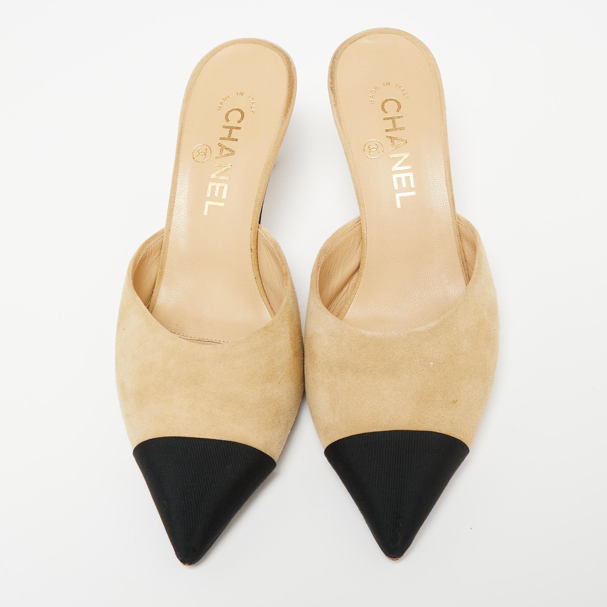 Chanel's creations are known for their unique designs that emanate the label's feminine verve and immaculate craftsmanship that makes their creations last season after season. Crafted from suede in a beige shade, these mules have been designed with