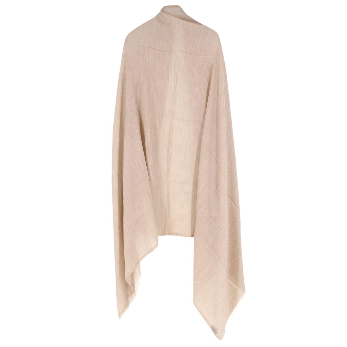 Chanel Beige Cashmere Camelia Scarf 

-Beige scarf with light camelia flower print
-Features raw hem detailing
-'CC' embroidered logo

Please note, these items are pre-owned and may show signs of being stored even when unworn and unused. This is