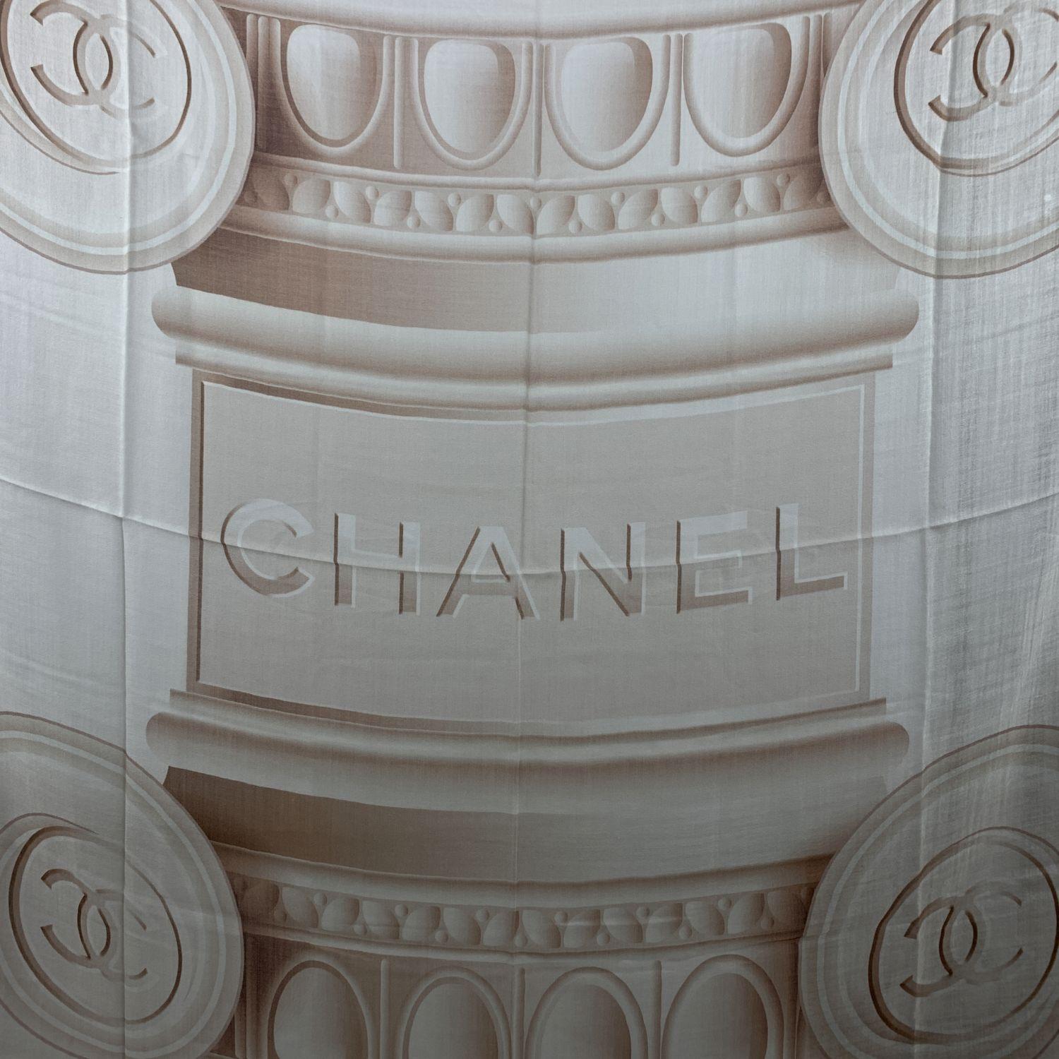 Chanel cashmere large scarf with Ionic capitals with Chanel signature pint. In beige colorway. Frayed edges. Contrast dark borders. Composition: 100% Cashmere. Measurements: 55 x 55 inches - 139.7 x 139.7 cm . Made in Italy

Details

MATERIAL: