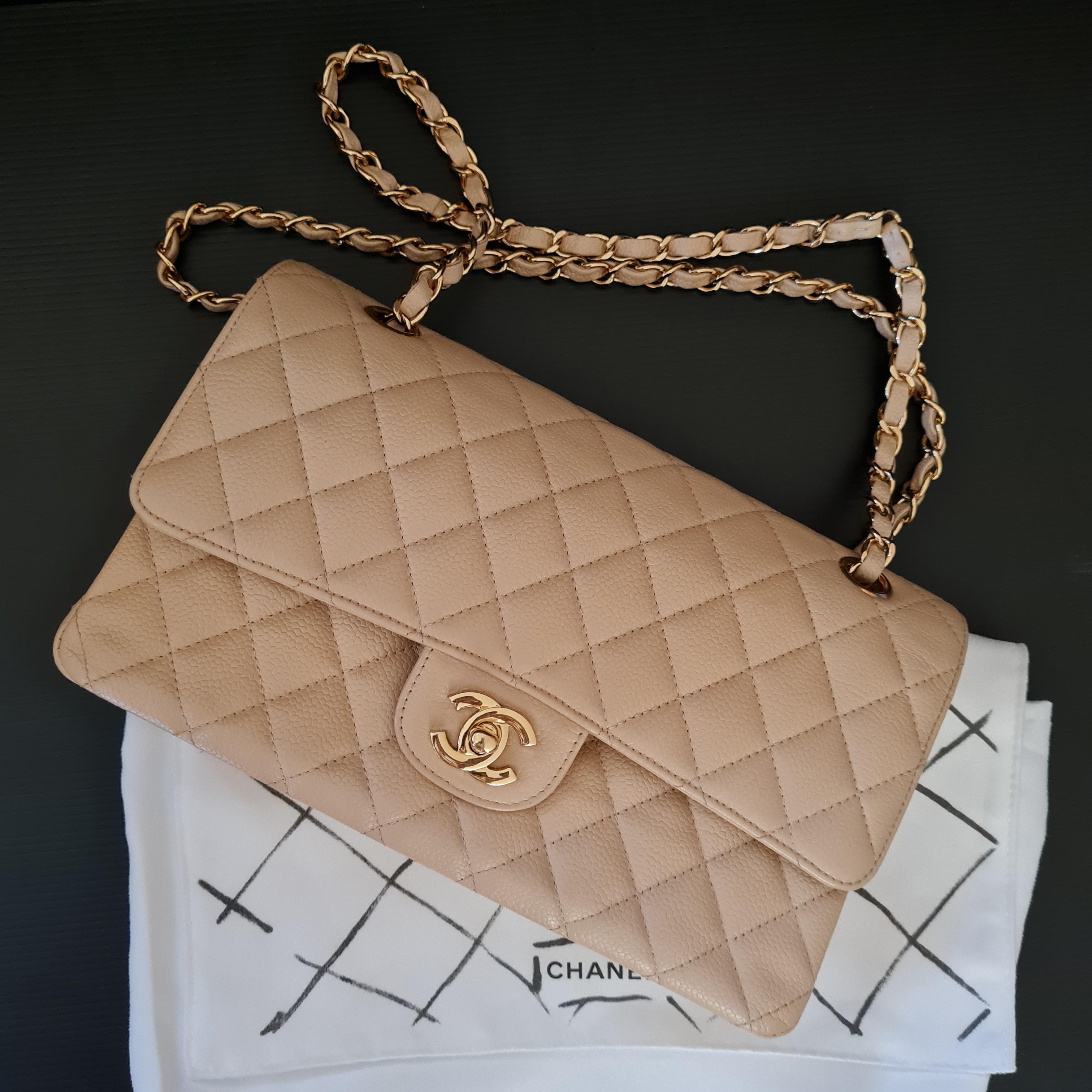 Chanel Beige Caviar Medium Double Flapbag GHW. Overall still in great condition. Series 15.

Inclusion: Dust Bag