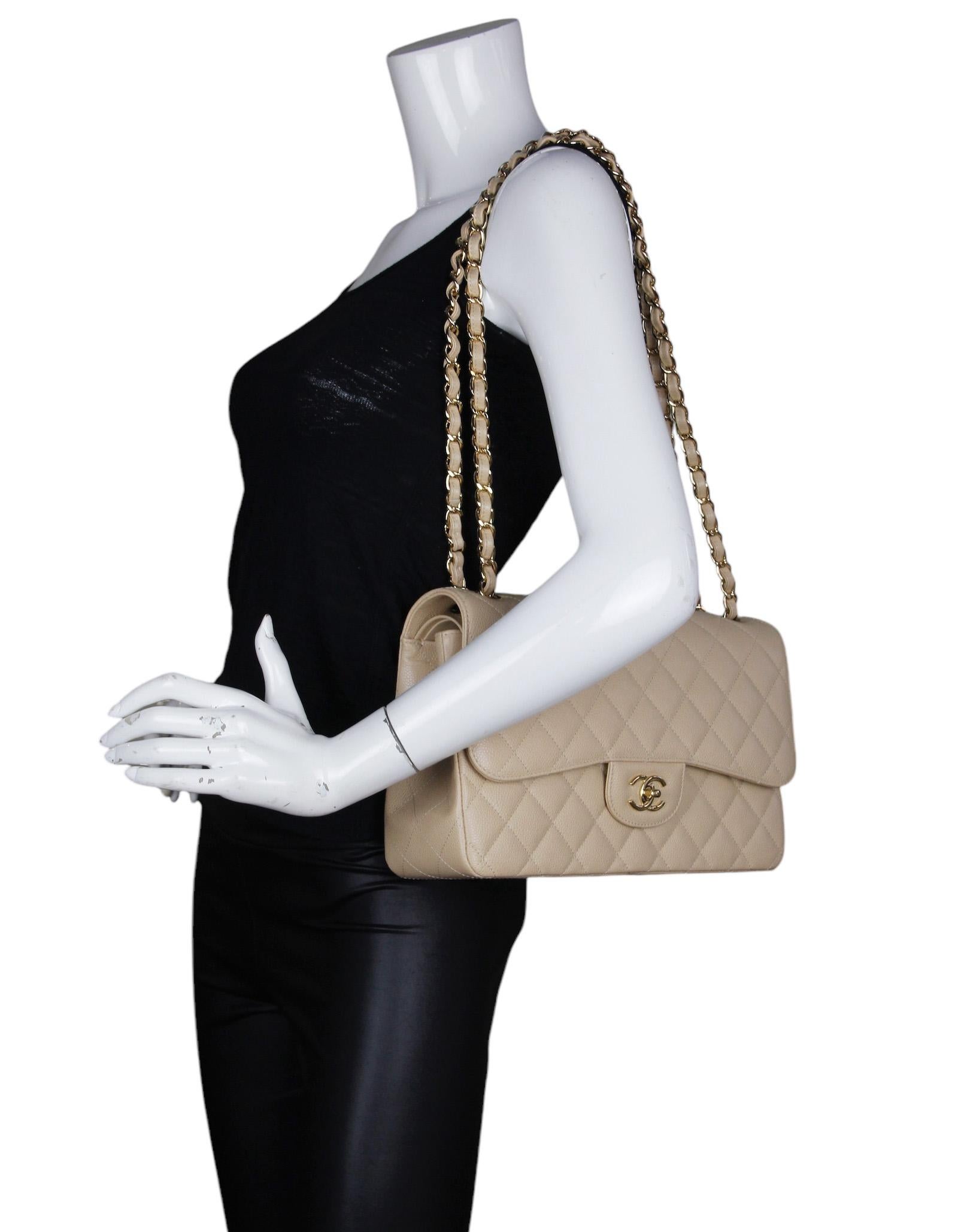 Chanel Beige Caviar Leather Quilted Classic Double Flap Jumbo Bag with Gold Hardware 

Made In: France
Color: Beige 
Hardware: Goldtone
Materials: Caviar Leather
Lining: Leather
Closure/Opening: Top flap with CC turnlock
Exterior Pockets: One flat