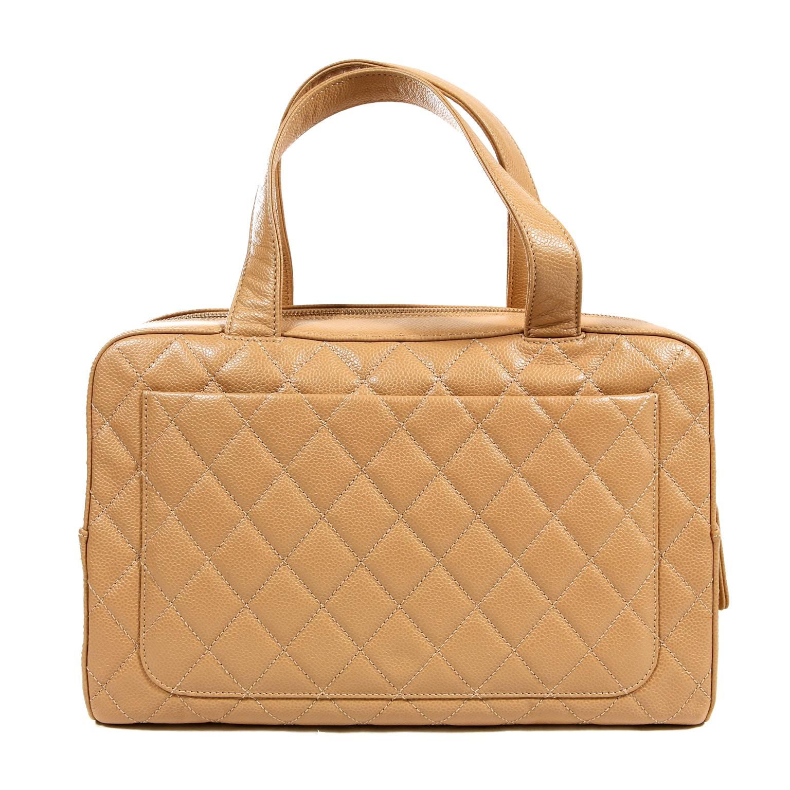 Chanel Beige Caviar Quilted Satchel- PRISTINE; never carried. 
The perfect day bag, it carries everything yet manages effortless sophistication.
Textured and durable beige caviar leather is quilted in signature Chanel diamond pattern.  Gold