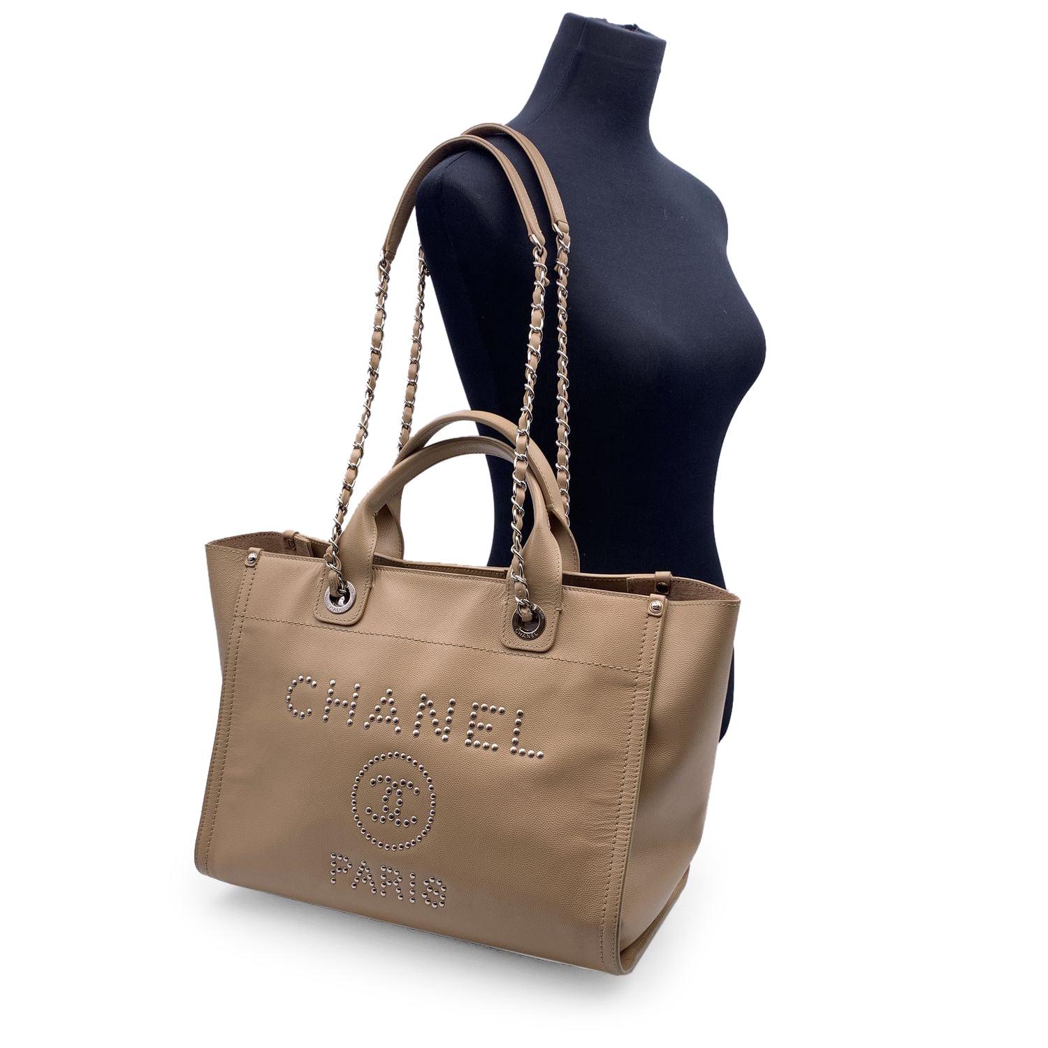 This beautiful Bag will come with a Certificate of Authenticity provided by Entrupy. The certificate will be provided at no further cost. Entrupy for this item at no further cost. Beautiful Chanel 'Deauville' tote, crafted in beige caviar leather.