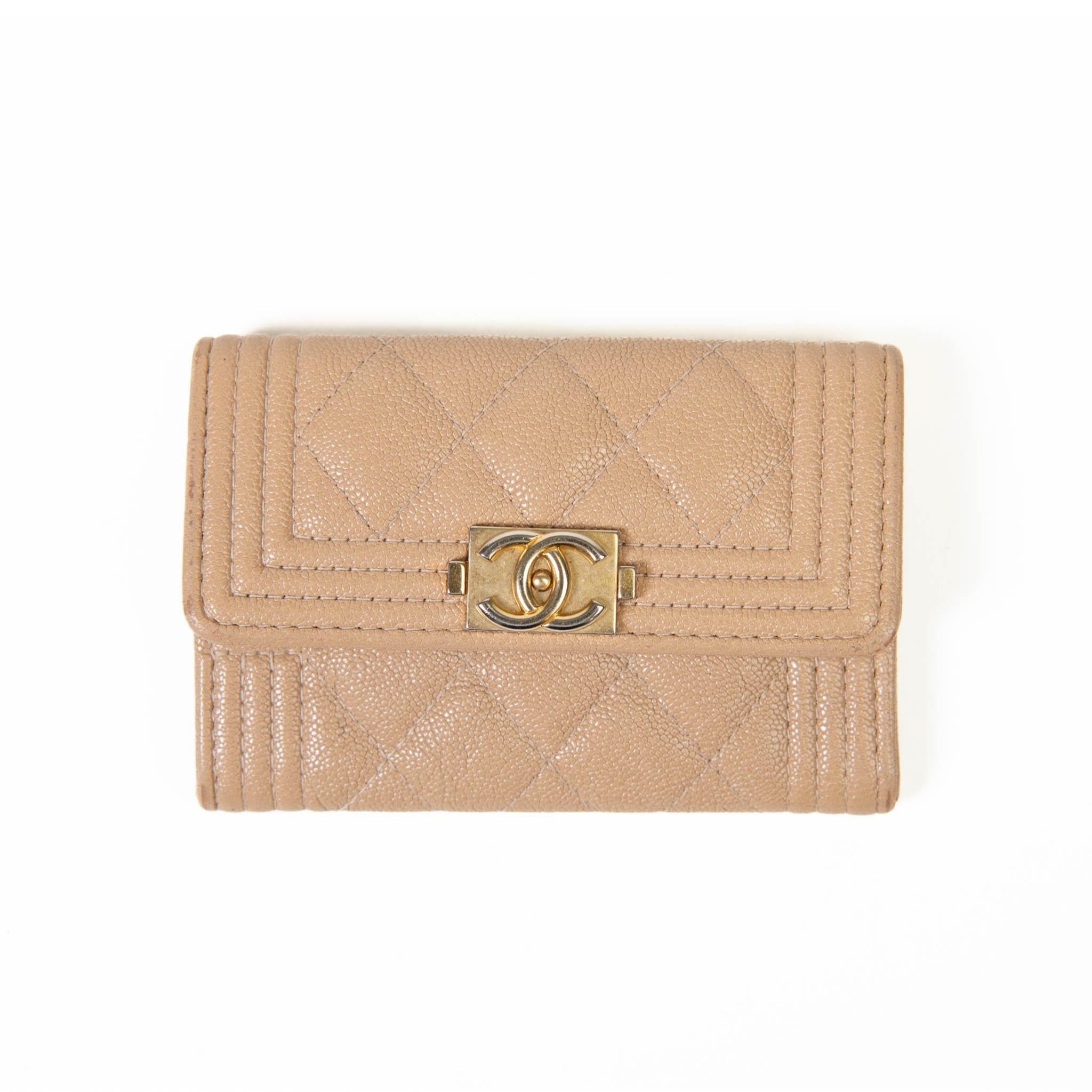 Chanel Beige Caviar Quilted Boy Flap Card Holder Wallet
This stylish wallet is crafted of diamond-quilted caviar leather in beige, with a linear-quilted peripheral border. The cardholder features an aged gold Boy CC push lock detail on the crossover