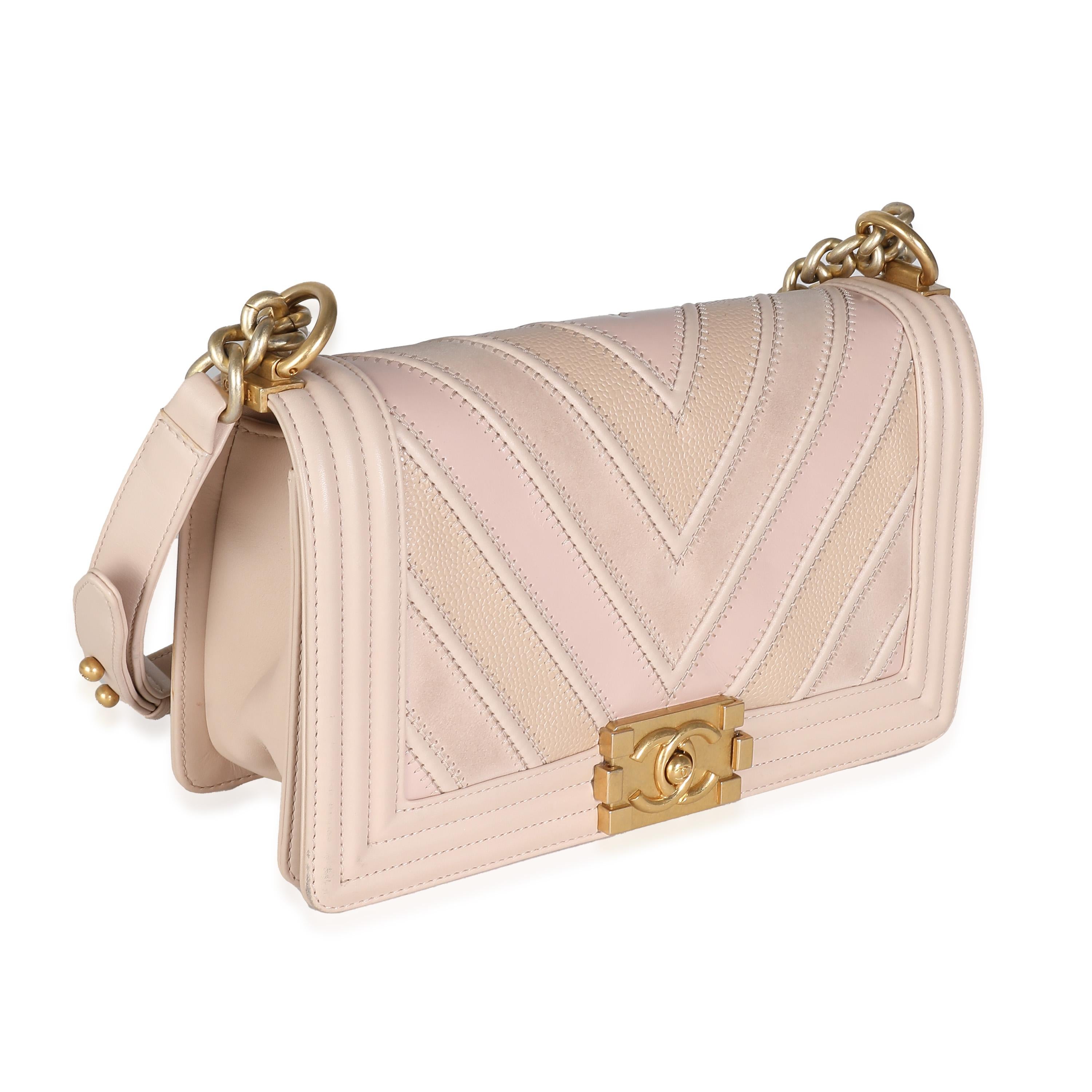 Listing Title: Chanel Beige Caviar Suede Calfskin Chevron Medium Boy Bag
SKU: 137255
Condition: Pre-owned 
Condition Description: An instant classic, the Boy bag from Chanel was introduced in 2011. The quilted bag was designed by the late Karl
