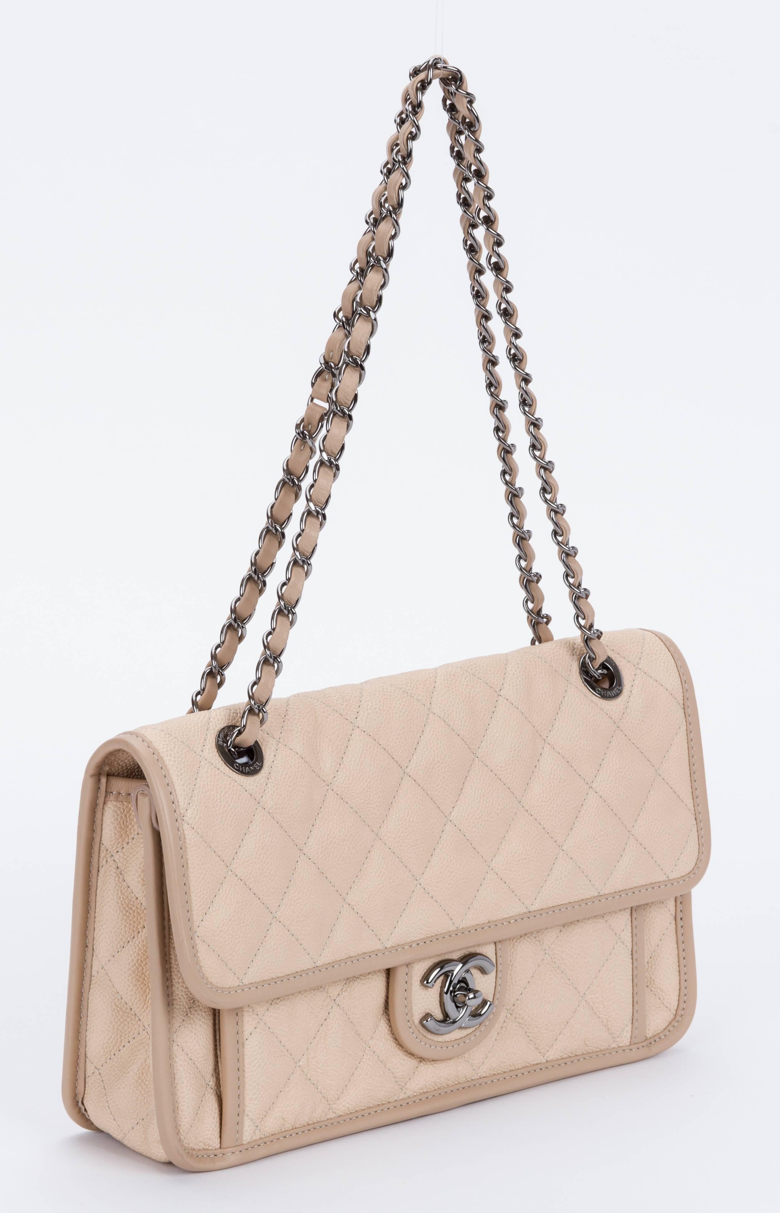hanel beige cavair jumbo novelty flap with darker trim. Comes with hologram, id card, partial plastic on internal hardware and original box. Strap drop 9