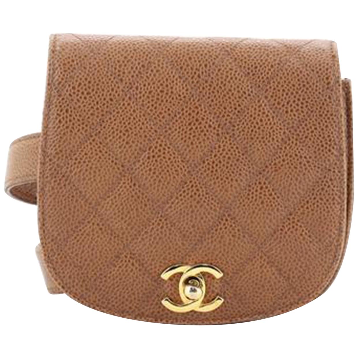 Chanel Vintage Beige CC Flap Waist Bag Quilted Caviar Small Bag

Color: Brown
Material: Leather
Hardware Color: Gold

5.5