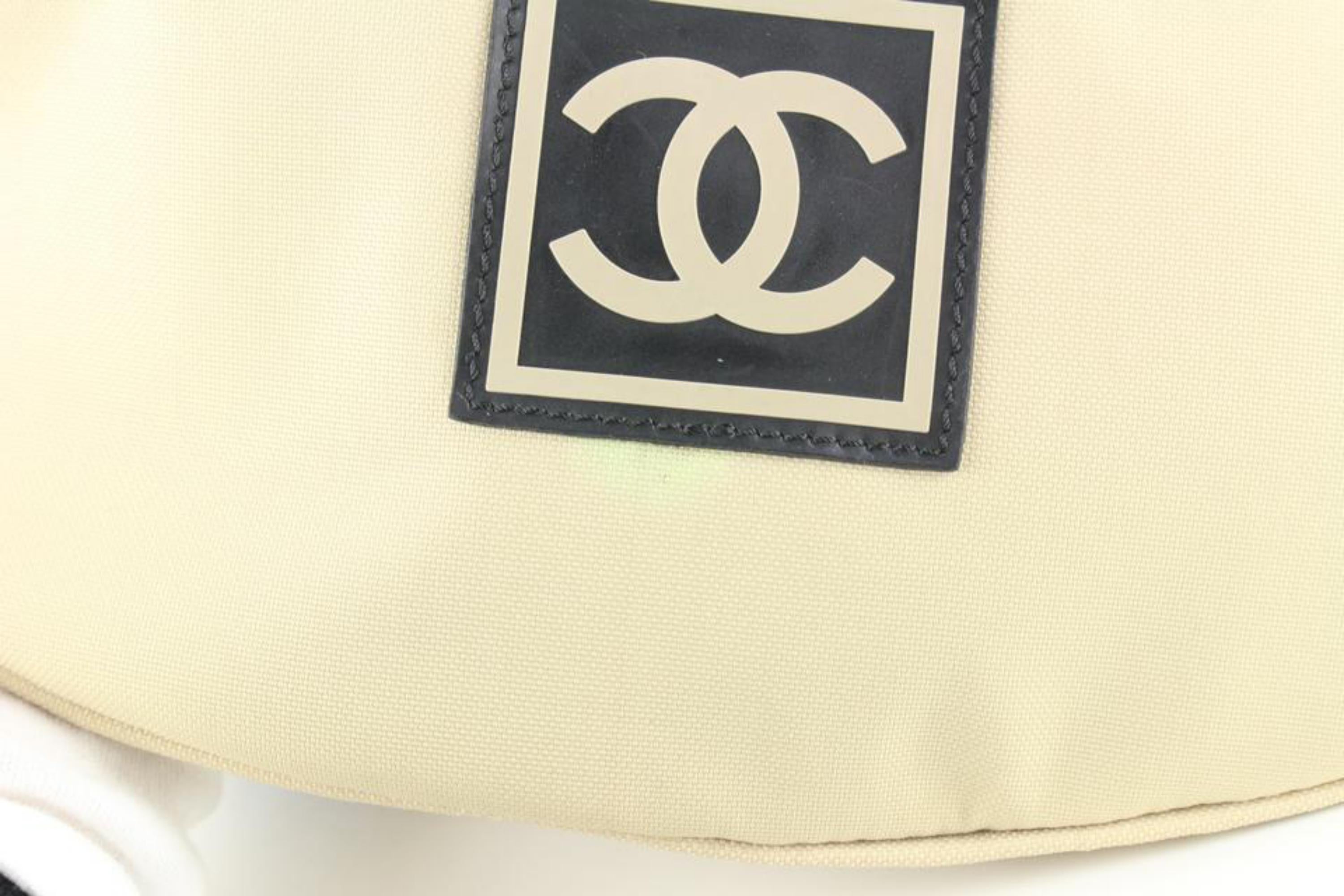 Chanel Beige CC Logo Sports Sling Banana Bum Bag 2C1027 In Excellent Condition For Sale In Dix hills, NY
