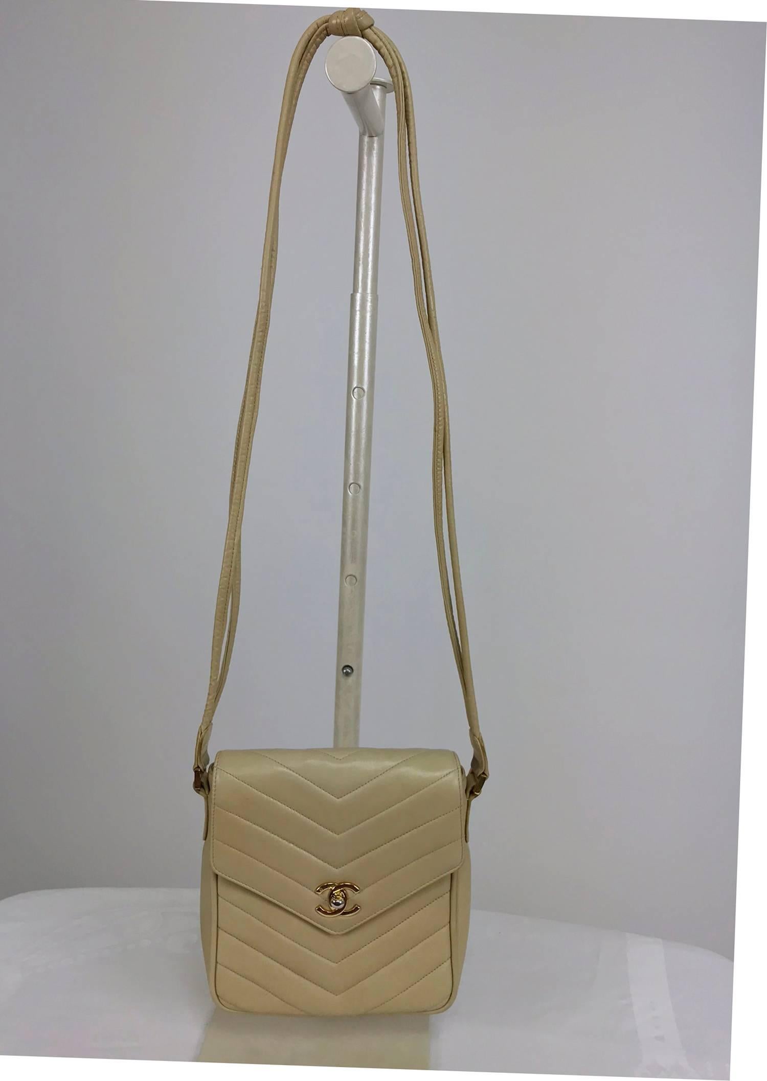 Chanel beige chevron leather  shoulder/cross body camera style handbag from the late 1980s...A beautiful bag with a lovely patina and perfect if a large bag is more than you need...Can be worn as a cross body, the strap drop is 18 inches, so check