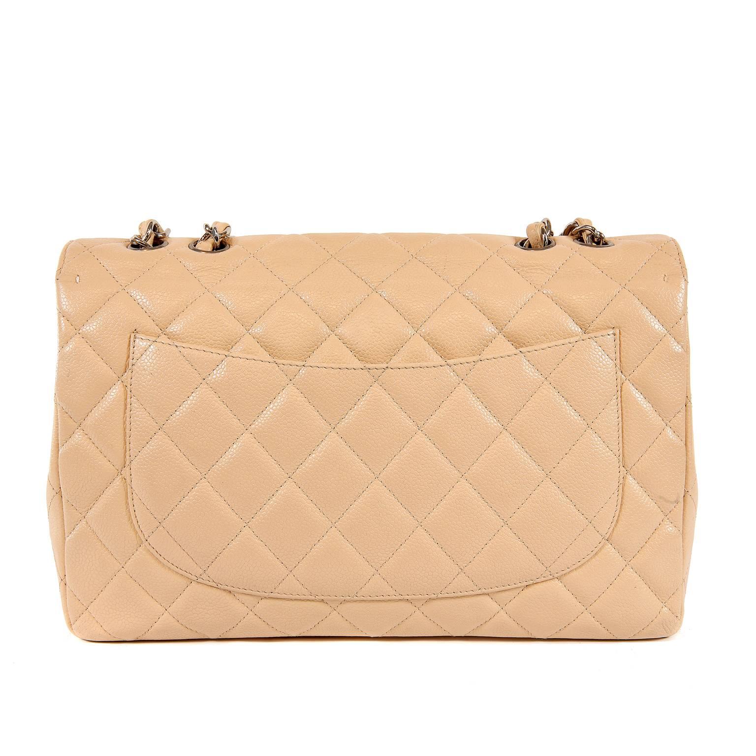 Chanel Beige Clair Caviar Jumbo Classic Flap Bag- Excellent PLUS 
Rarely seen in the single flap design, this soft light beige balances out a collection that is heavy on black bags.  
Beige Clair caviar leather is textured and durable.  Quilted in