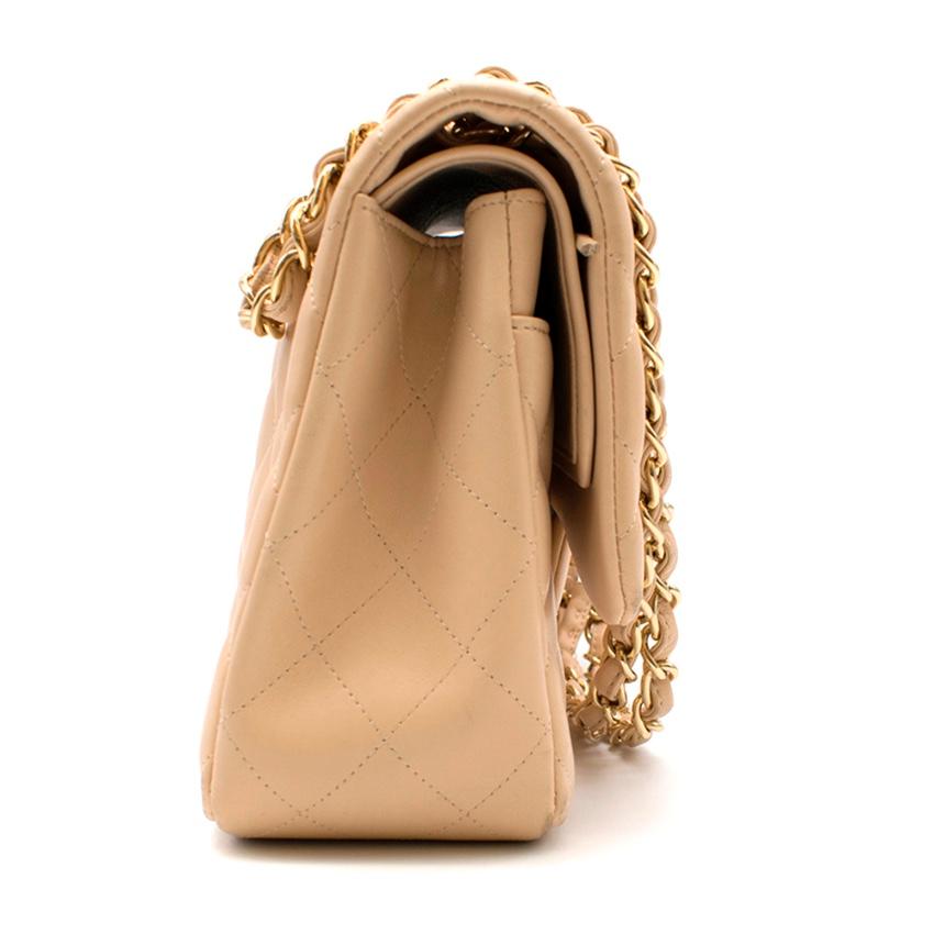 CHANEL Classic Double Flap Jumbo Beige Caviar with Gold Hardware. 

Please note, these items are pre-owned and may show signs of being stored even when unworn and unused. This is reflected within the significantly reduced price. Please refer to