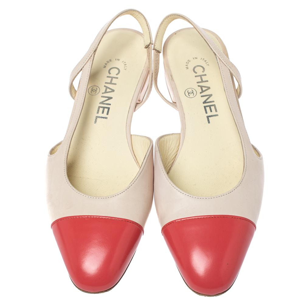 An iconic design by Chanel is this two-tone pair. These beige sandals are crafted from leather and come with coral red cap toes. They flaunt slingbacks, leather-lined insoles, and low heels that carry the signature CC logo.

Includes: Original