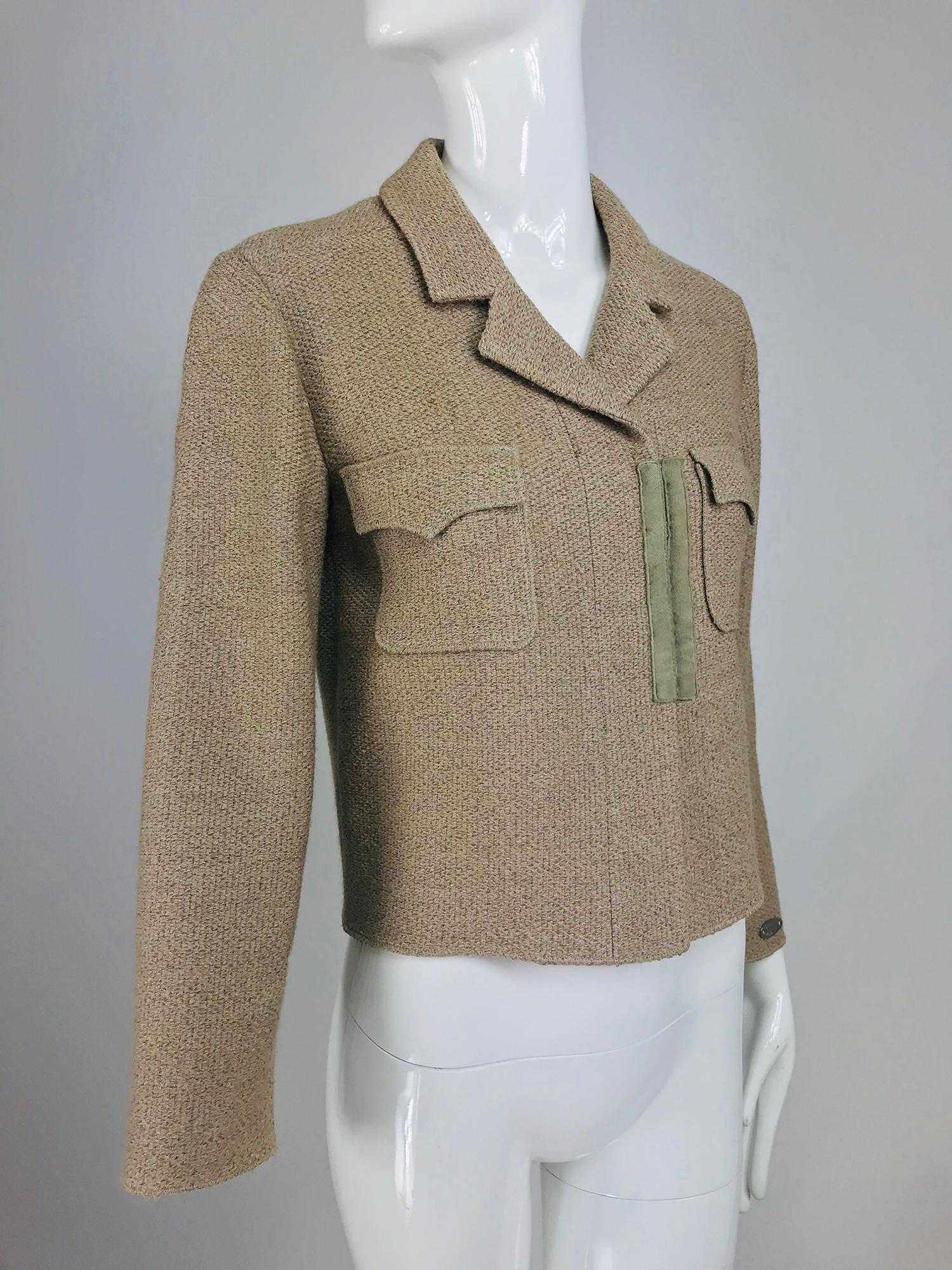 Chanel Beige Double Pocket Hook Front Unlined Jacket 02A. Great jacket to to pair with jeans or anything casual. This jacket closes at the front with hidden logo hooks and a single hidden logo button you see at the front vertical bands of taupe