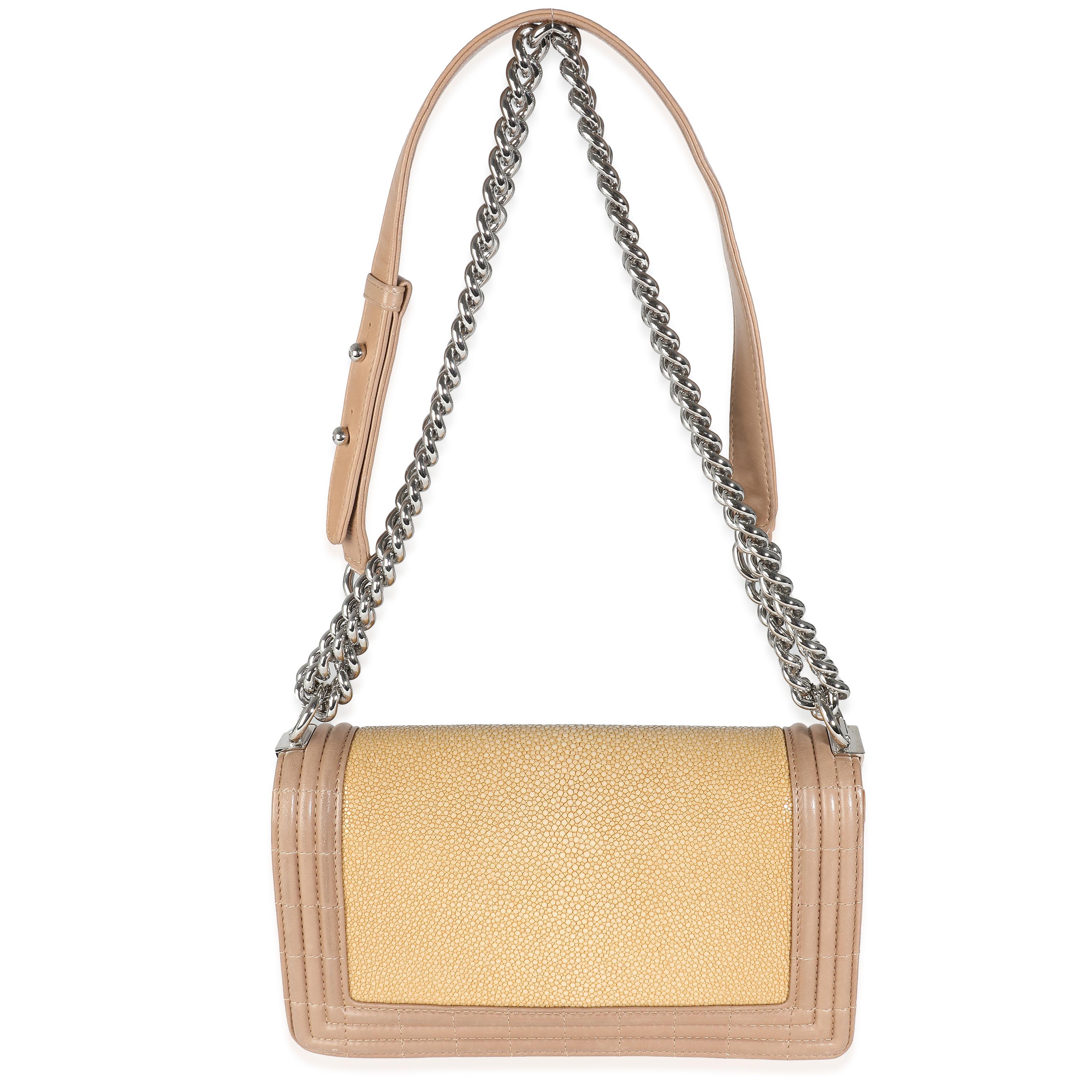 Listing Title: Chanel Beige Galuchat Stingray Lambskin Medium Boy Flap
SKU: 141886
Condition: Pre-owned 
Condition Description: An instant classic, the Boy bag from Chanel was introduced in 2011. The quilted bag was designed by the late Karl