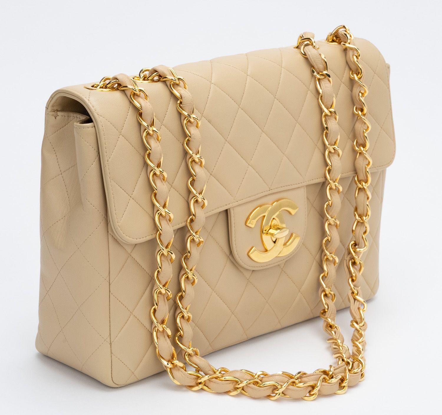 Chanel 90s jumbo beige lambskin single flap with 24kt gold plated hardware. Excellent condition. Shoulder drop 13