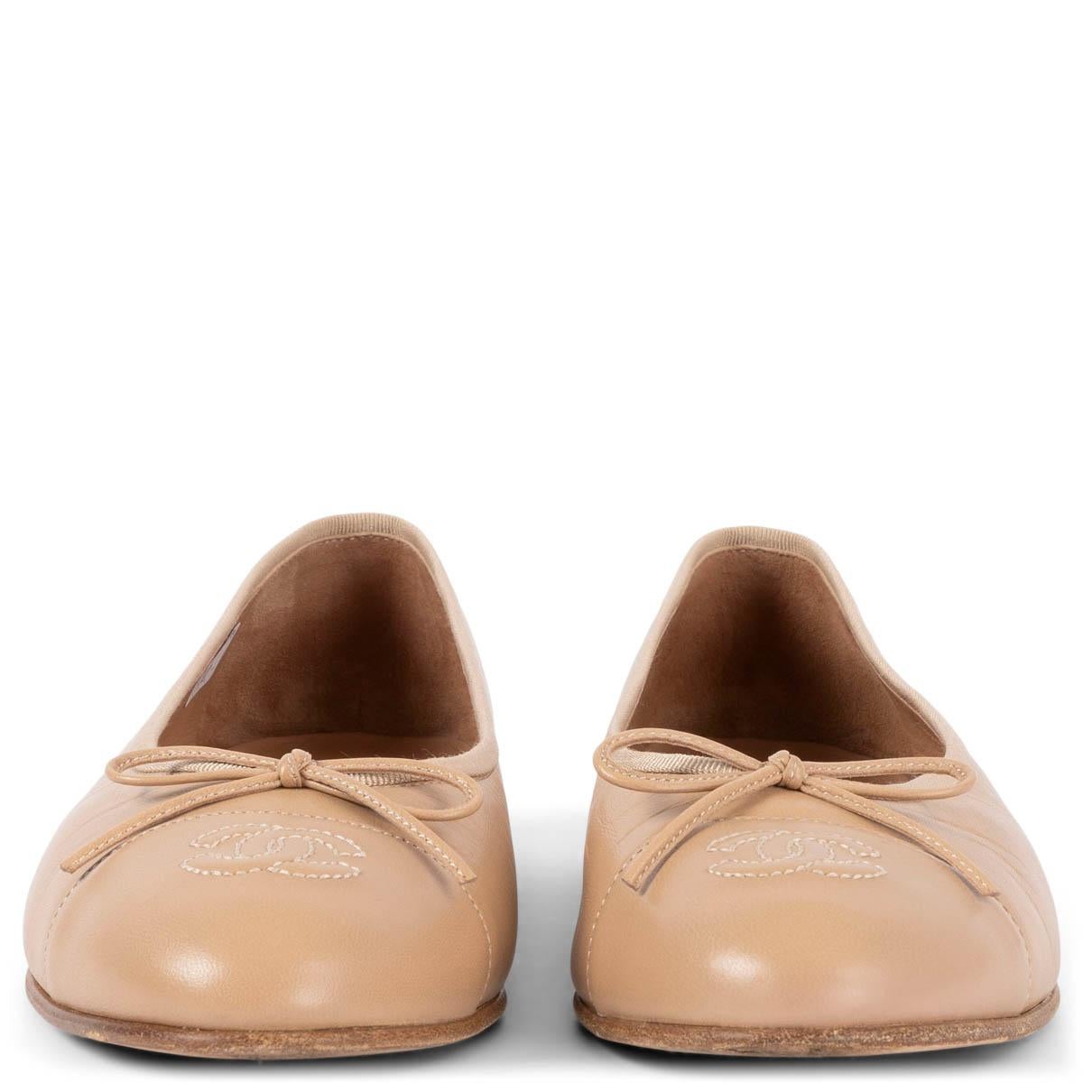 100% authentic Chanel classic ballet flats in tan smooth calfskin with CC logo stitching on cap toe. Have been worn and are in excellent condition. 

Measurements
Model	G02819
Imprinted Size	38.5
Shoe Size	38
Inside Sole	25cm (9.8in)
Width	7.5cm