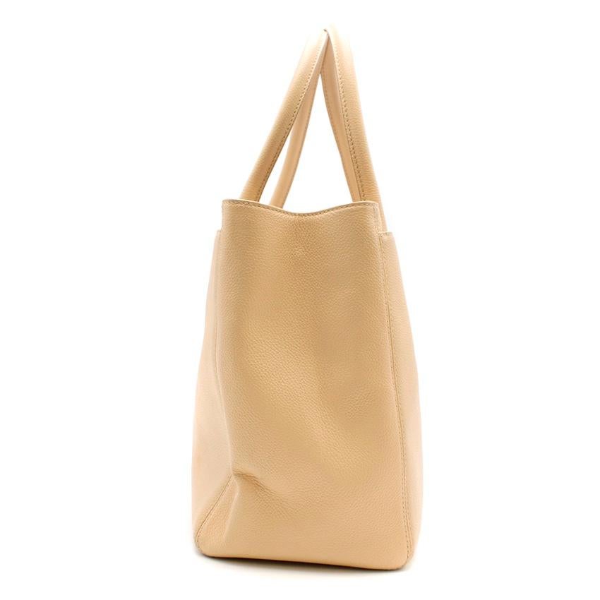 Chanel Beige Leather Cerf Tote Bag

- multiple compartments - CC lock on the front compartment - popper fastening inside - Classic chanel business style

Please note, these items are pre-owned and may show signs of being stored even when unworn and