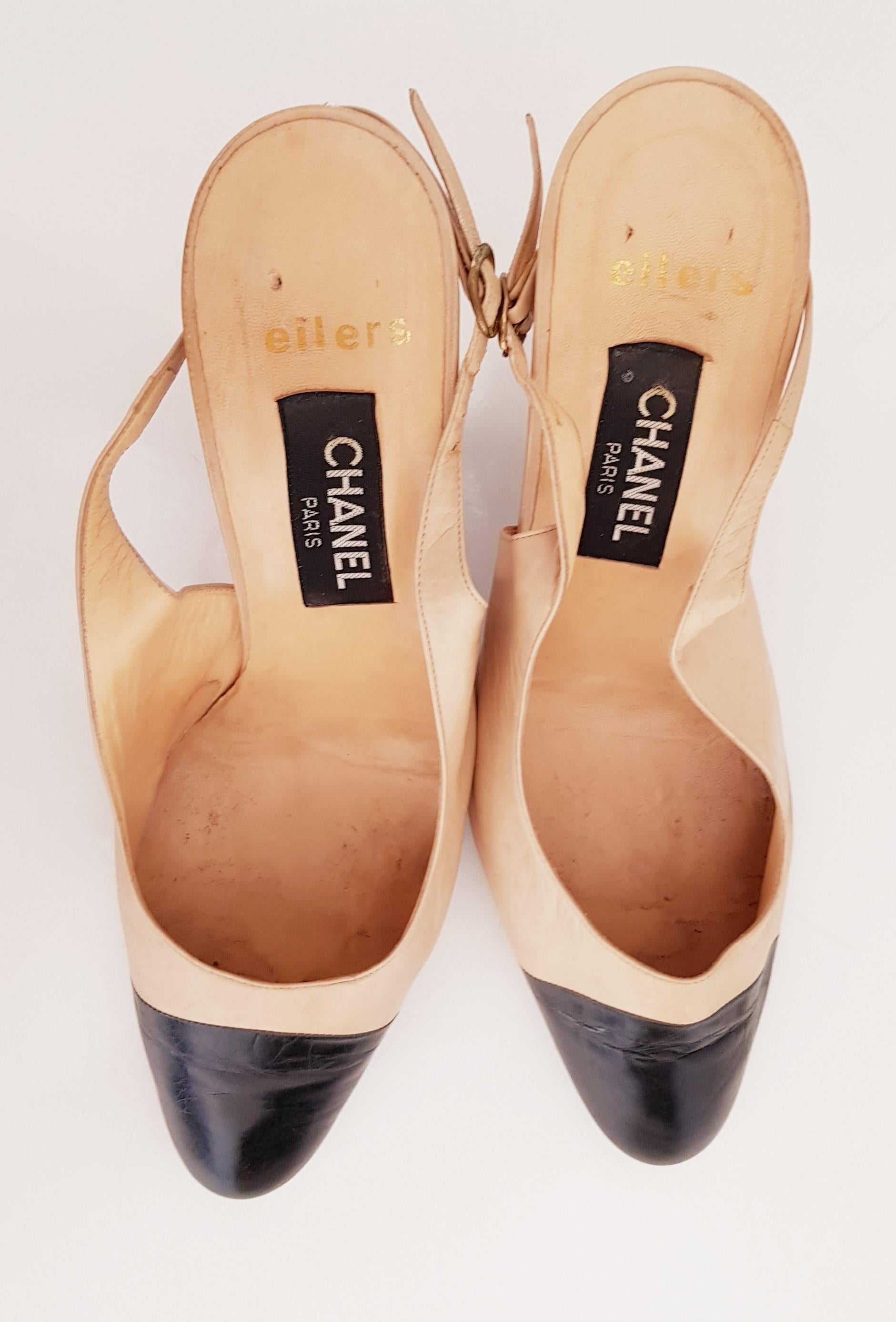 Chanel Beige Leather Heels with Black tip and small belt behind. For Sale 5