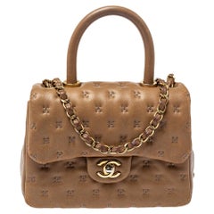 Chanel Beige Leder Paris-Rom Coco Top Handle Tasche