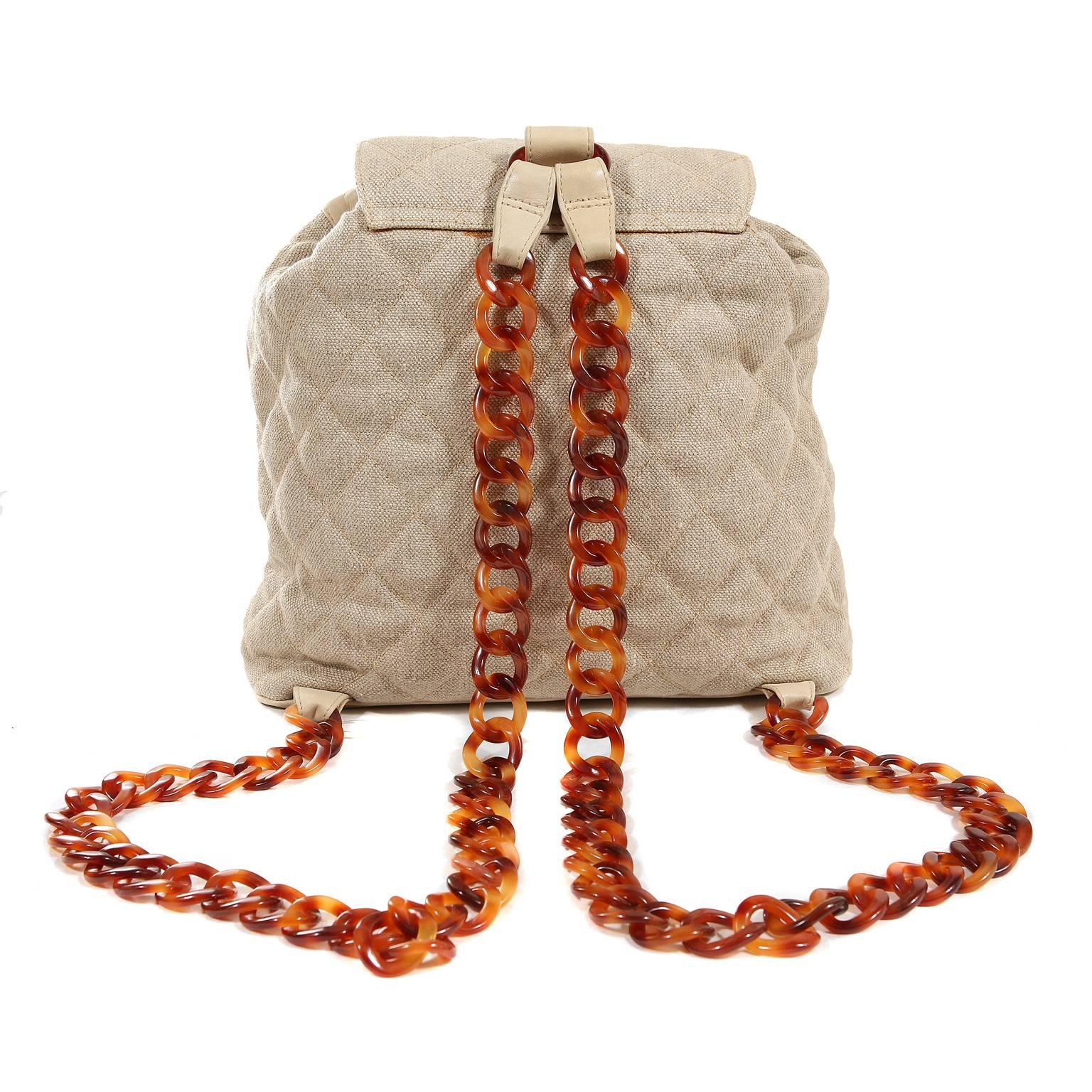 Chanel Quilted Linen Backpack- Excellent Plus condition
 A beautiful piece with tortoise resin accents, it is certain to be a favorite in any collection. 
Flax linen fabric is quilted in signature Chanel diamond pattern.  Large front pocket and top