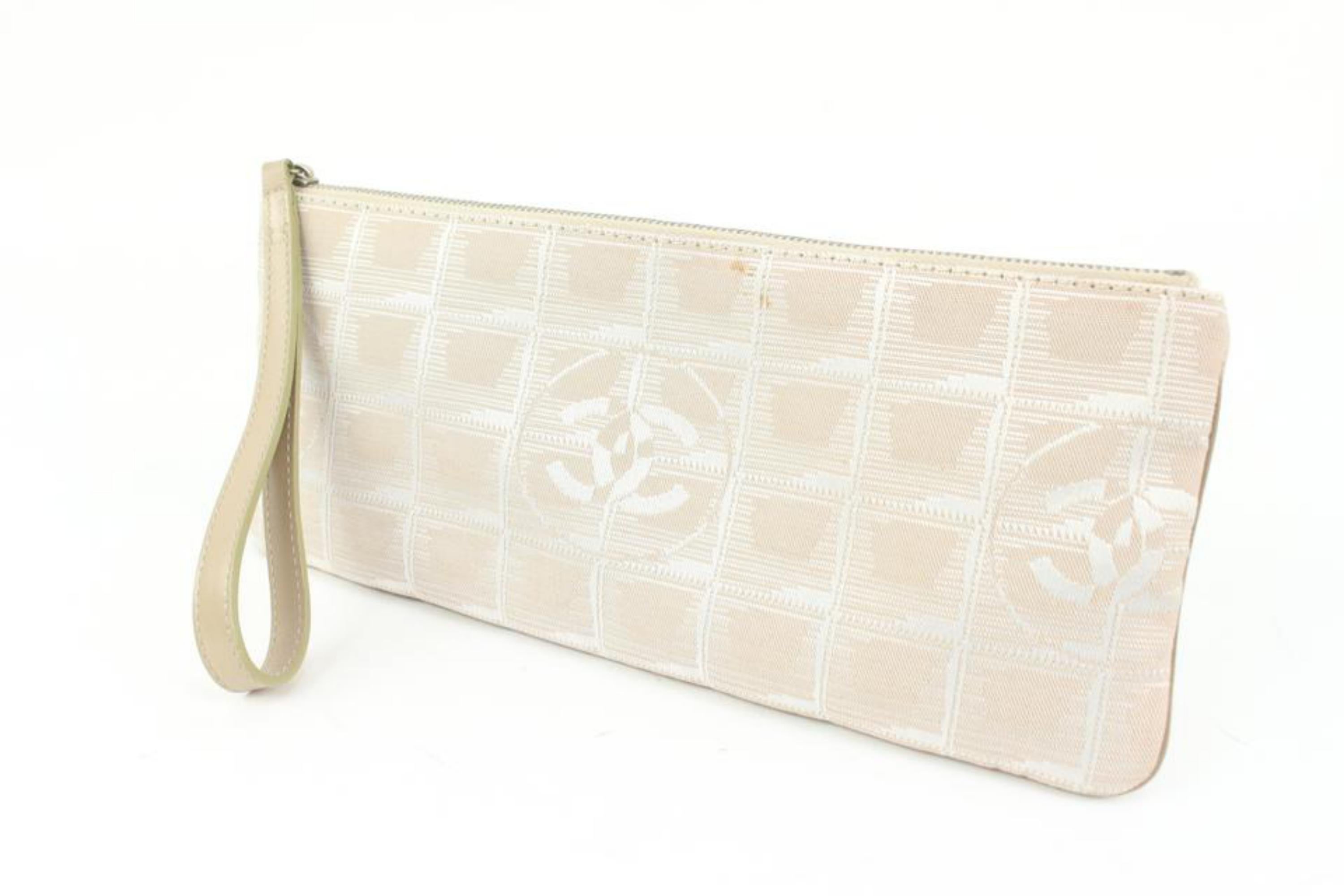 Chanel Beige New Line Pochette Wristlet Clutch 23ck324s
Date Code/Serial Number: 7382763
Made In: Italy
Measurements: Length:  10.5