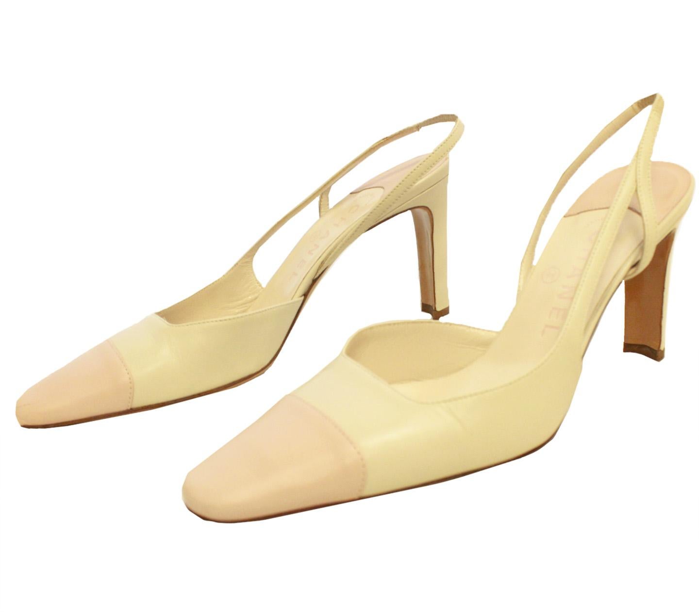 Chanel beige and pink leather slingback heels features signature cap toes in soft pink.  These shoes have at back elasticized ankle straps and covered square heels. The cream leather insoles are stamped “Chanel Made In Italy” in light pink.  With
