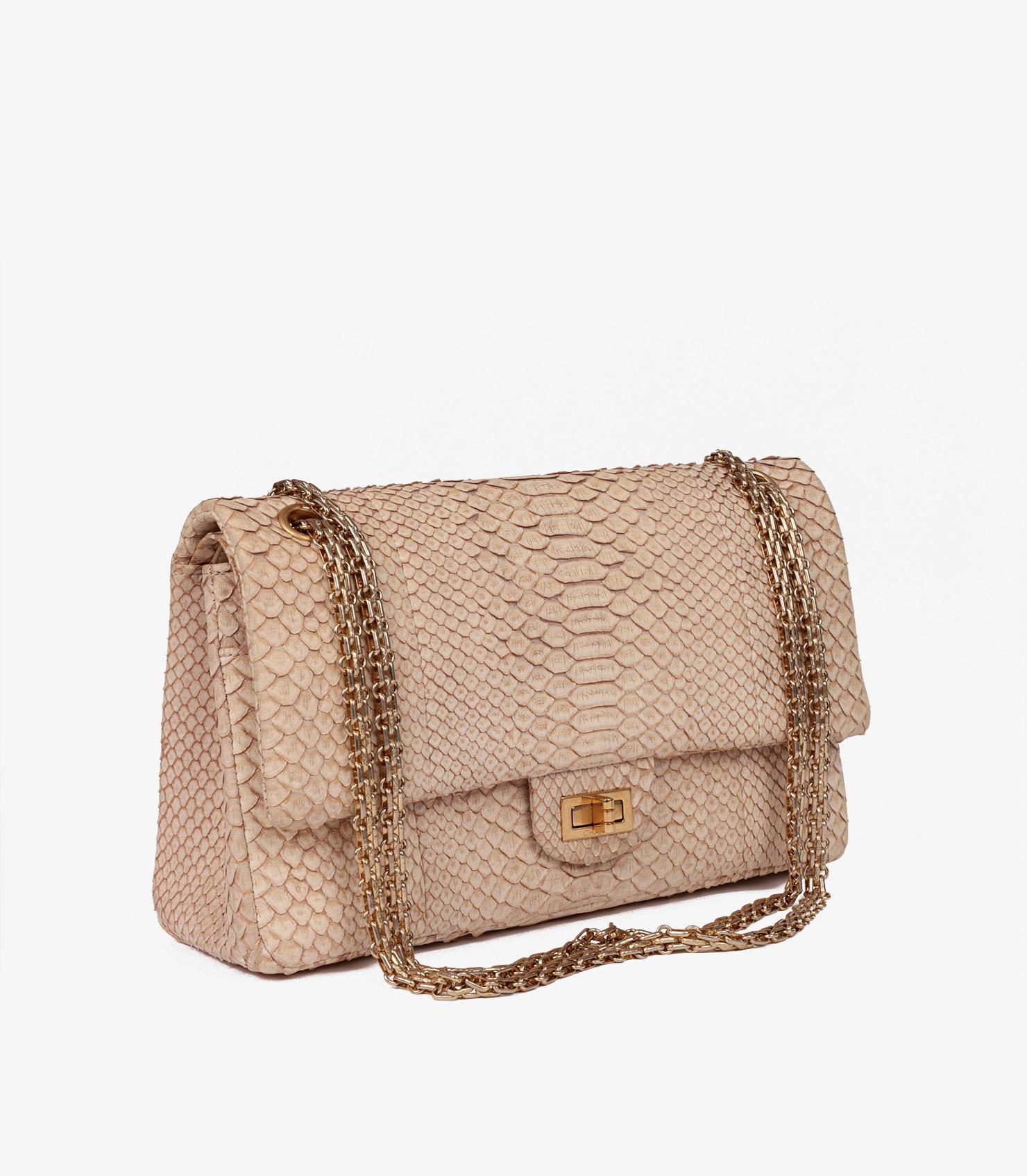 Chanel Beige Python Leather 226 2.55 Reissue Double Flap Bag

Product Details
Xupes Ref: CB1292
Brand: Chanel
Model: 226 2.55 Reissue Double Flap Bag
Type: Shoulder, Crossbody
Serial Number: 16297751
Age: 2012
Accompanied By: Chanel Dust Bag,