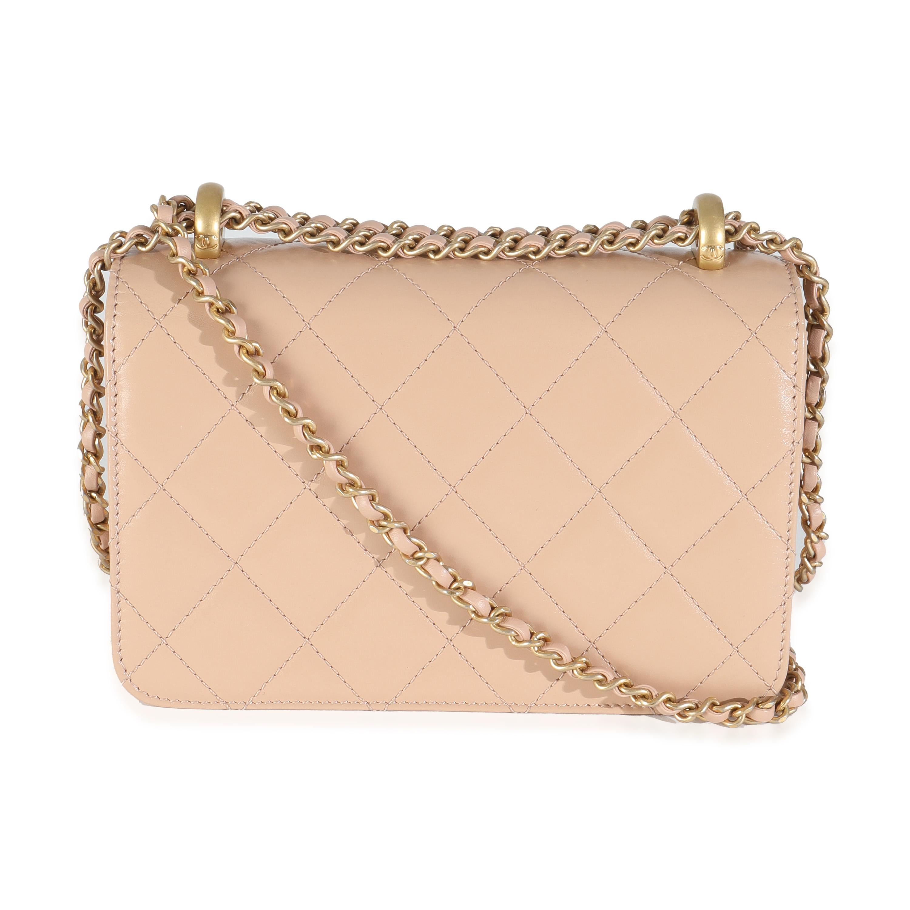Listing Title: Chanel Beige Quilted Calfskin Mini Perfect Fit Flap Bag
SKU: 144624
Condition: Pre-owned 
Condition Description: A timeless classic that never goes out of style, the flap bag from Chanel dates back to 1955 and has seen a number of