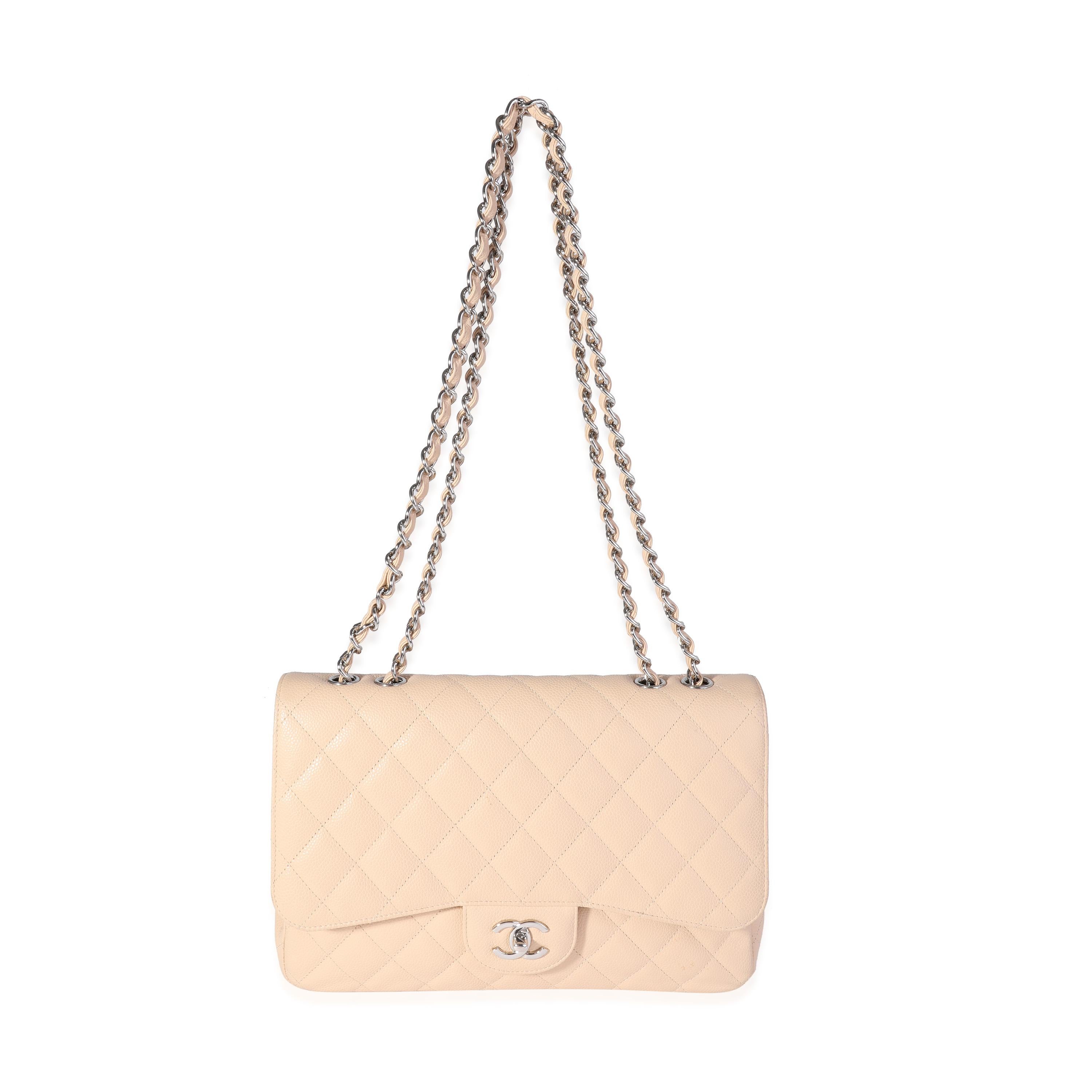 Listing Title: Chanel Beige Quilted Caviar Jumbo Classic Single Flap Bag
SKU: 120634
MSRP: 9500.00
Condition: Pre-owned (3000)
Handbag Condition: Good
Condition Comments: Good Condition. Scuffing throughout exterior and corners. Light scratching to
