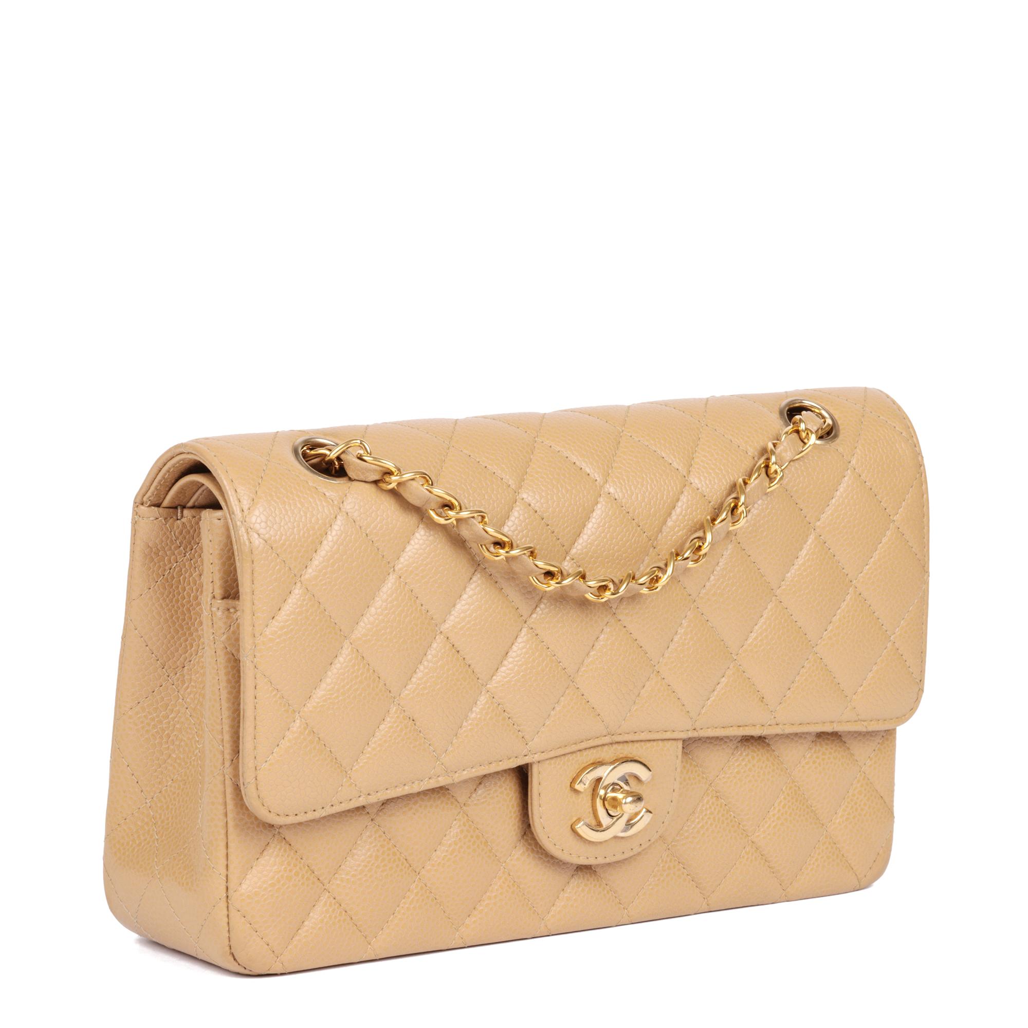 CHANEL
Beige Quilted Caviar Leather Medium Classic Double Flap Bag 

Xupes Reference: CB884
Serial Number: 9199819
Age (Circa): 2004
Accompanied By: Chanel Dust Bag, Box
Authenticity Details: Serial Sticker (Made in France)
Gender: Ladies
Type: