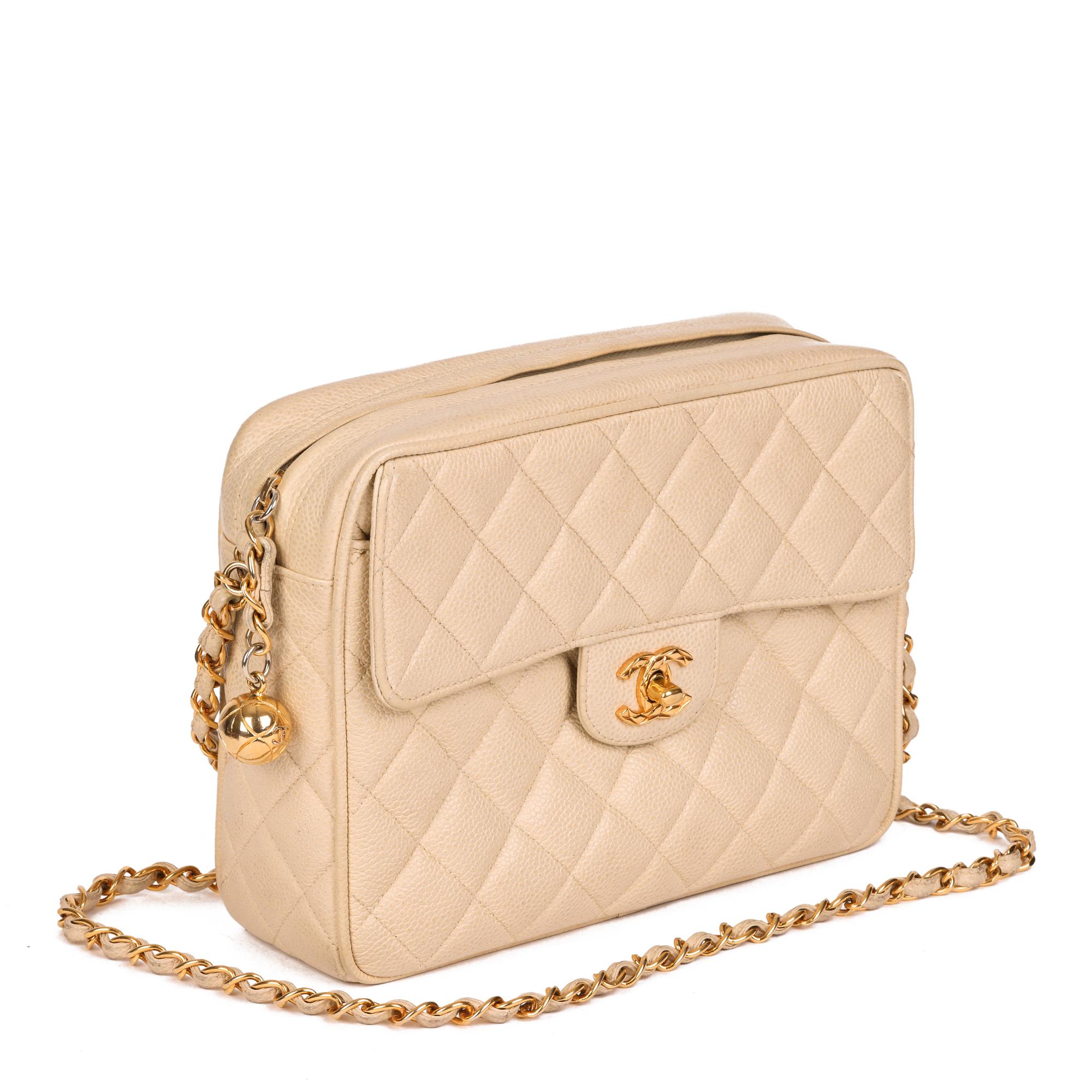 CHANEL
Beige Quilted Caviar Leather Vintage Small Classic Camera Bag

Serial Number: 3240167
Age (Circa): 1994
Accompanied By: Chanel Dust Bag
Authenticity Details: Serial Sticker (Made in France)
Gender: Ladies
Type: Shoulder, Crossbody

Colour: