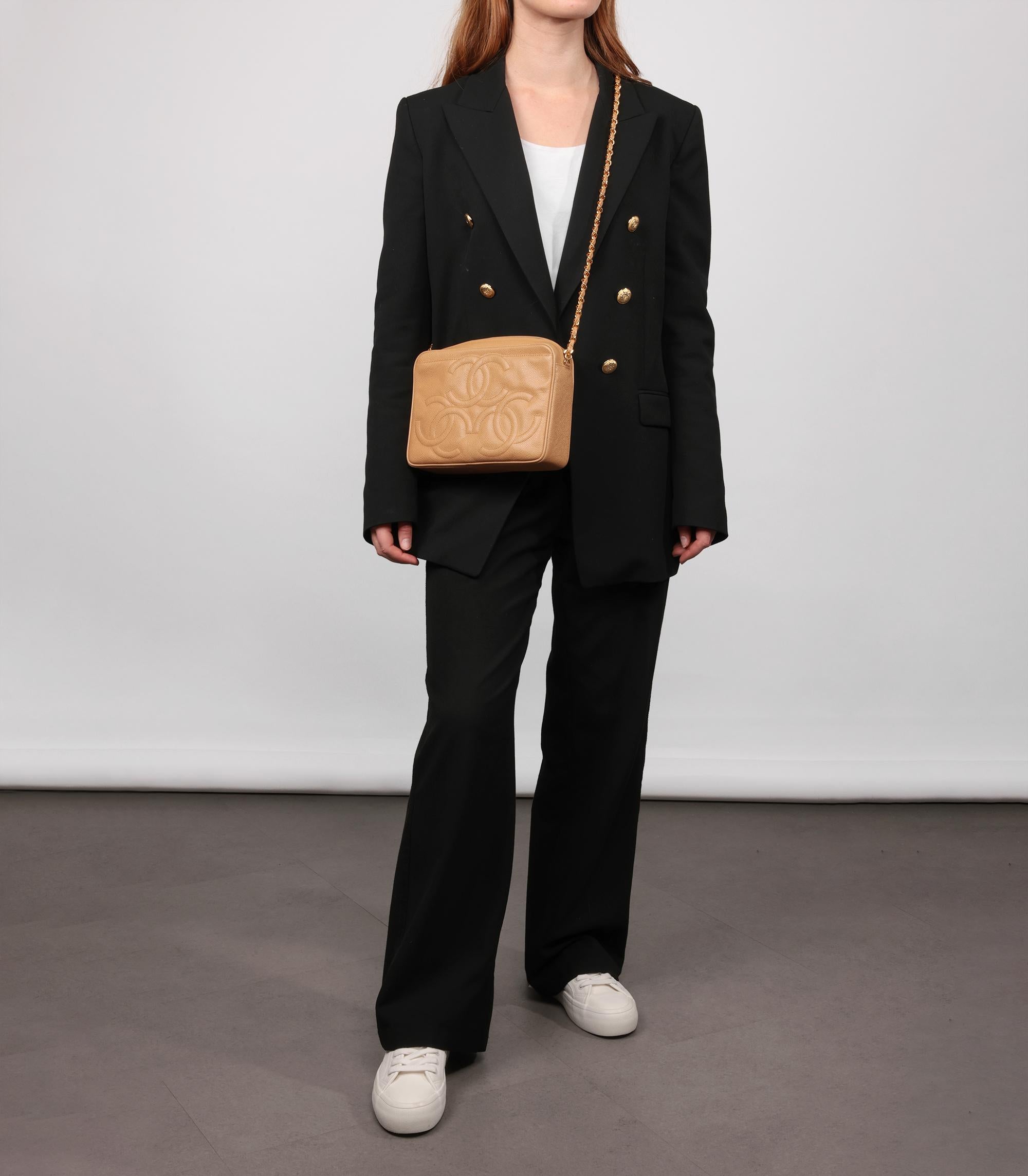 Chanel Beige Quilted Caviar Leather Vintage Small Triple Logo Camera Bag

Product Details
Xupes Ref: HB5724
Brand: Chanel
Model: Small Triple Logo Camera Bag
Type: Shoulder, Crossbody
Serial Number: 3173405
Age: 1994
Accompanied By: Chanel Dust Bag,