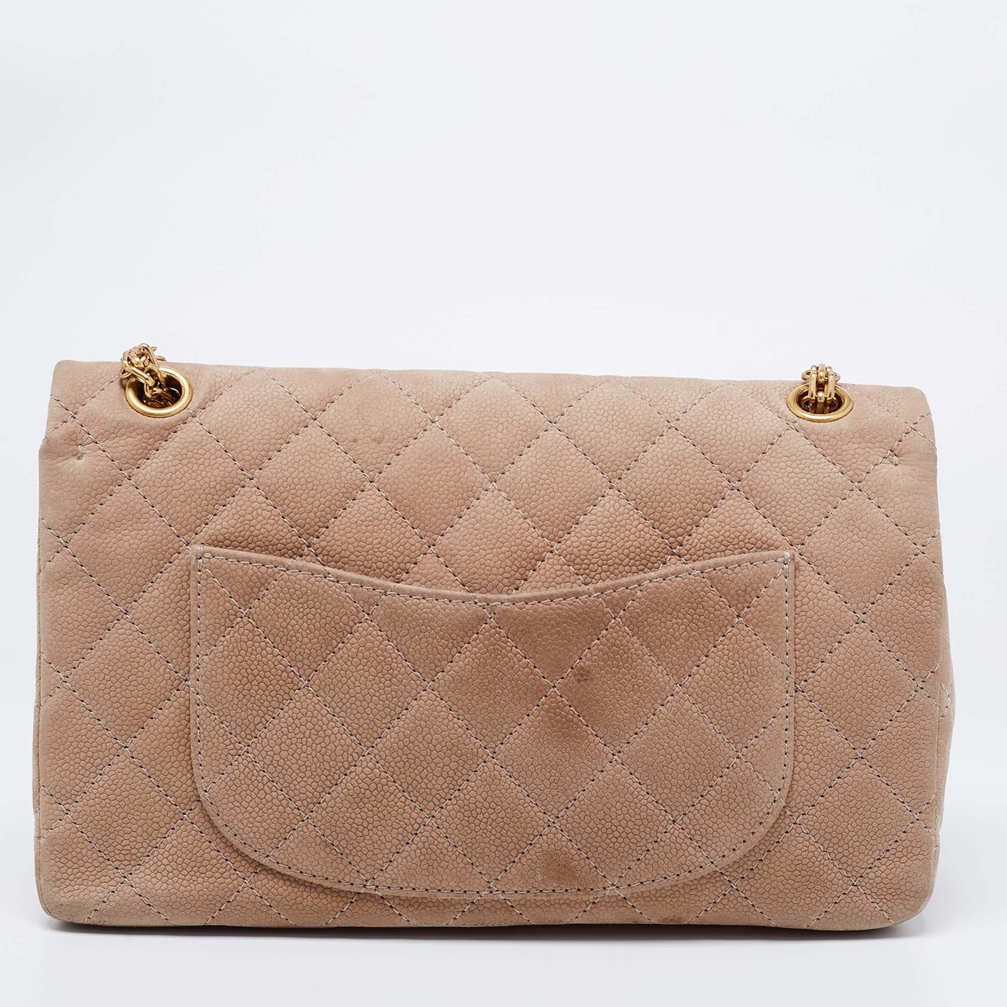 Introduce Chanel's irreplaceable style to your closet with this Reissue 2.55 Classic 226 Flap bag. Crafted using Caviar nubuck leather, the bag has a signature quilted exterior, the Mademoiselle lock on the front, and a leather-lined interior.