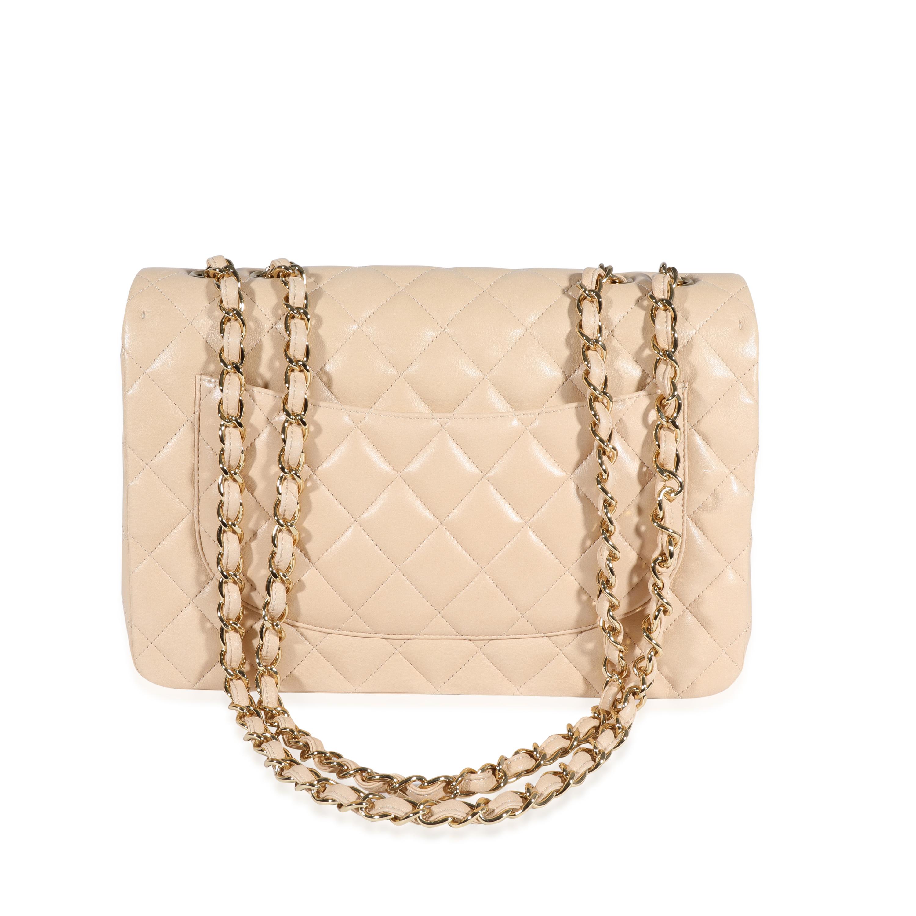 Listing Title: Chanel Beige Quilted Lambskin Jumbo Classic Single Flap Bag
SKU: 122119
MSRP: 9500.00
Condition: Pre-owned 
Handbag Condition: Very Good
Condition Comments: Faint scuffing at exterior. Light scratching at hardware. Scuffing at