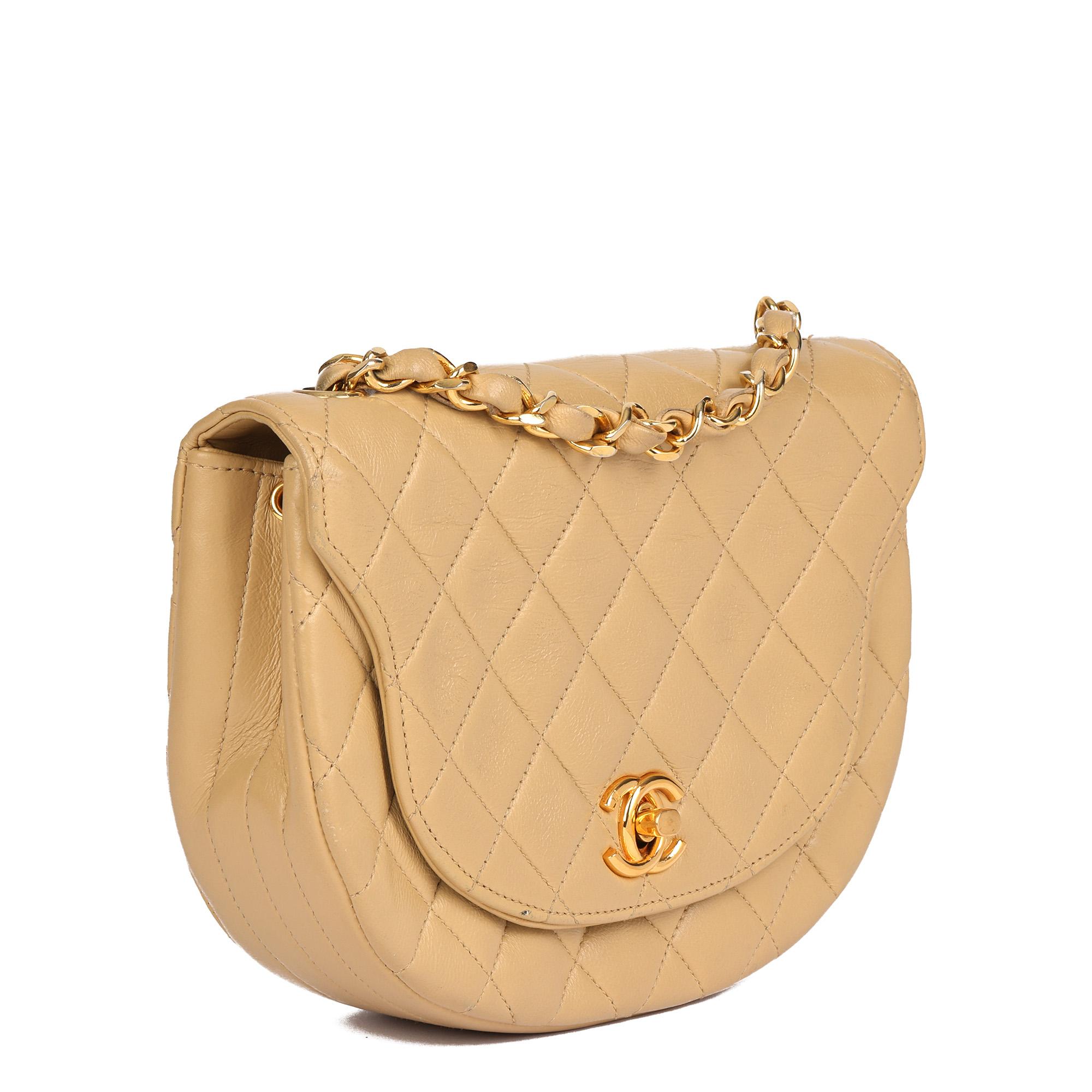 CHANEL
Beige Quilted Lambskin Vintage Half Moon Mini Flap Bag 

Serial Number: 0605447
Age (Circa): 1989
Accompanied By: Authenticity Card
Authenticity Details: Authenticity Card, Serial Sticker (Made in France)
Gender: Ladies
Type: Shoulder,