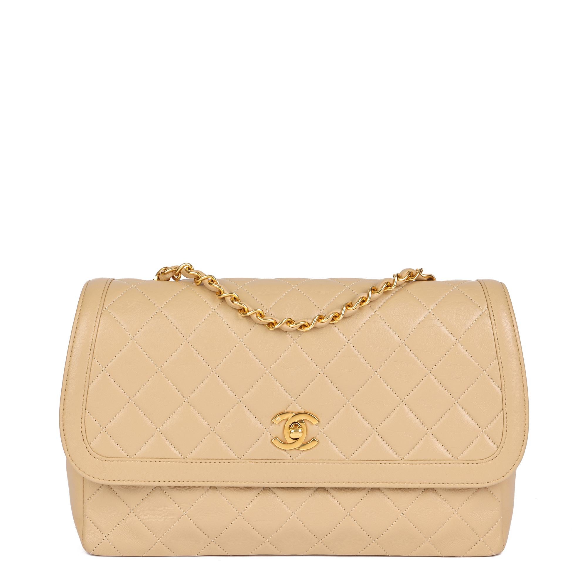 CHANEL
Beige Quilted Lambskin Vintage Medium Classic Single Flap Bag with Wallet

Serial Number: 1505848
Age (Circa): 1990
Accompanied By: Chanel Wallet, Authenticity Card, Care Booklet
Authenticity Details: Authenticity Card, Serial Sticker (Made