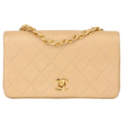 Chanel Beige gesteppte Vintage-Mini-Klappentasche aus Lammfell