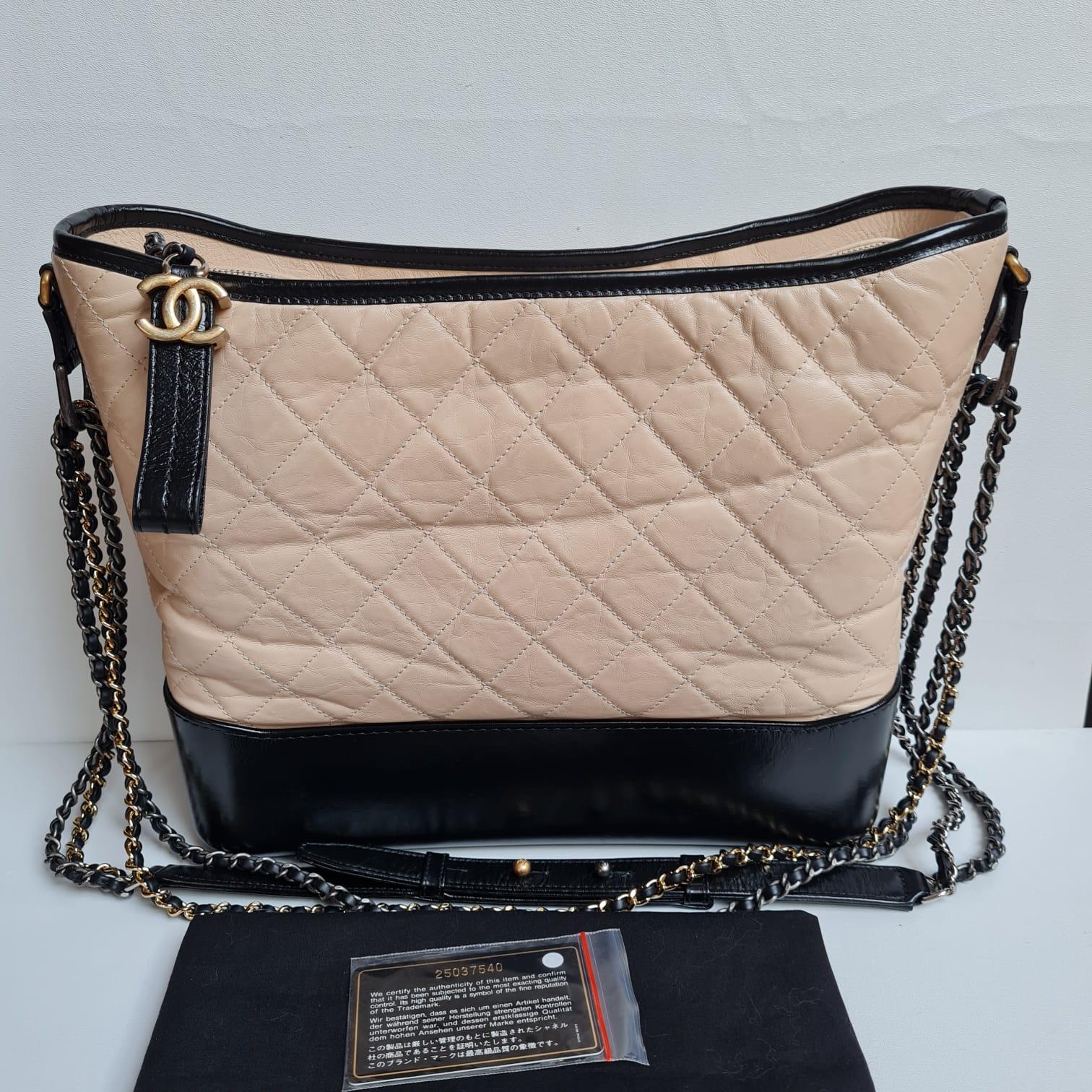 A classic gabrielle bag in large size. Beautiful condition other than the creasing on the mid section of the bag. Wont be as visible once filled up. Light marks on the bottom smooth leather. Beautiful bright pink lining. Item series #25. Comes with
