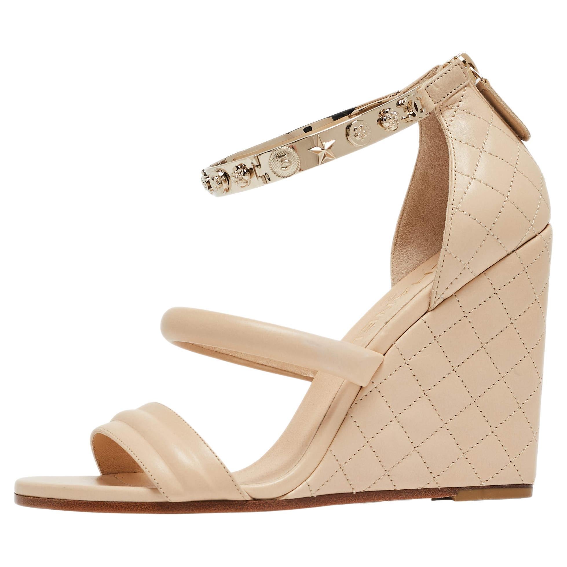 Chanel Beige Quilted Leather Charm Embellished Ankle Cuff Wedge Sandals Size 39 For Sale
