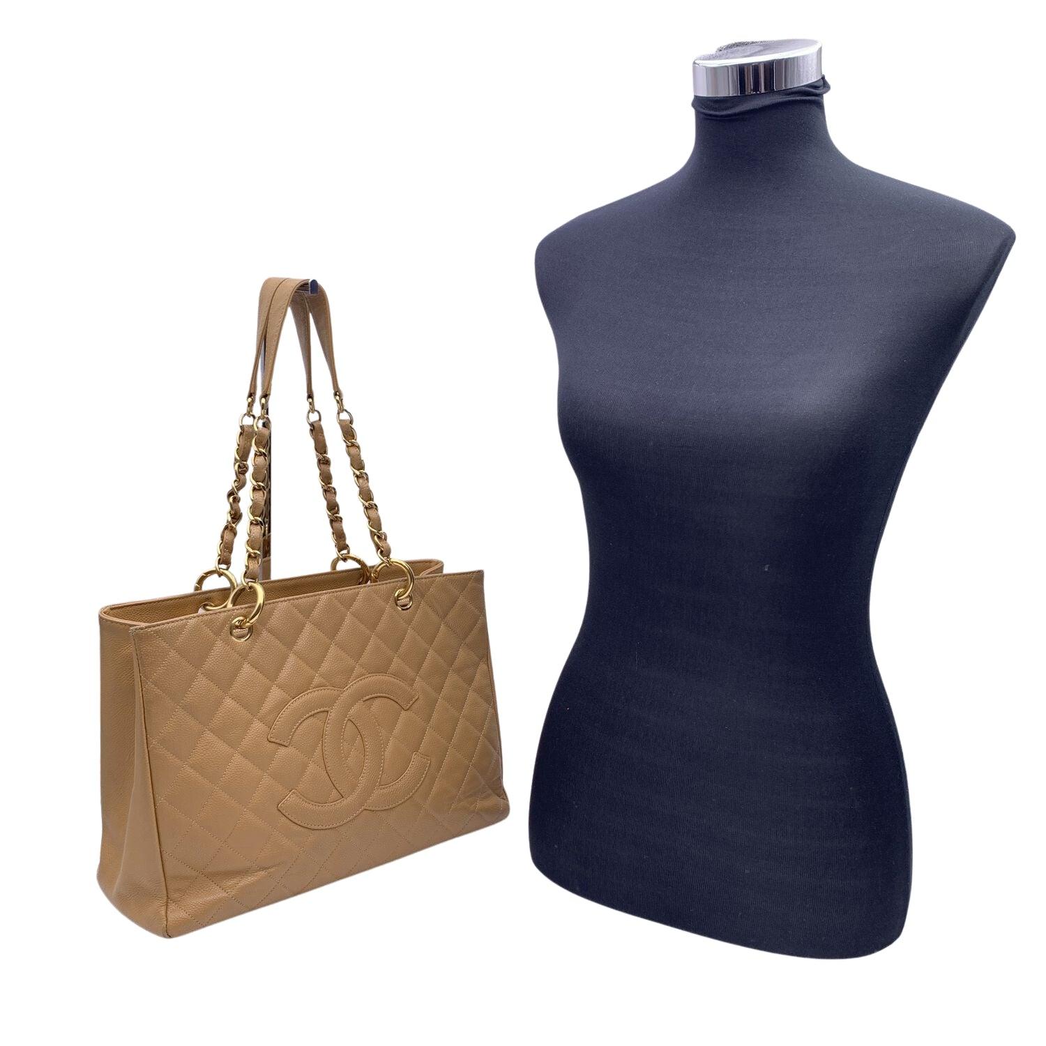 This beautiful Bag will come with a Certificate of Authenticity provided by Entrupy. The certificate will be provided at no further cost. A true icon of early 2000s luxury, this stunning CHANEL Grand Shopping Tote (GST) from the 2005/2006 collection