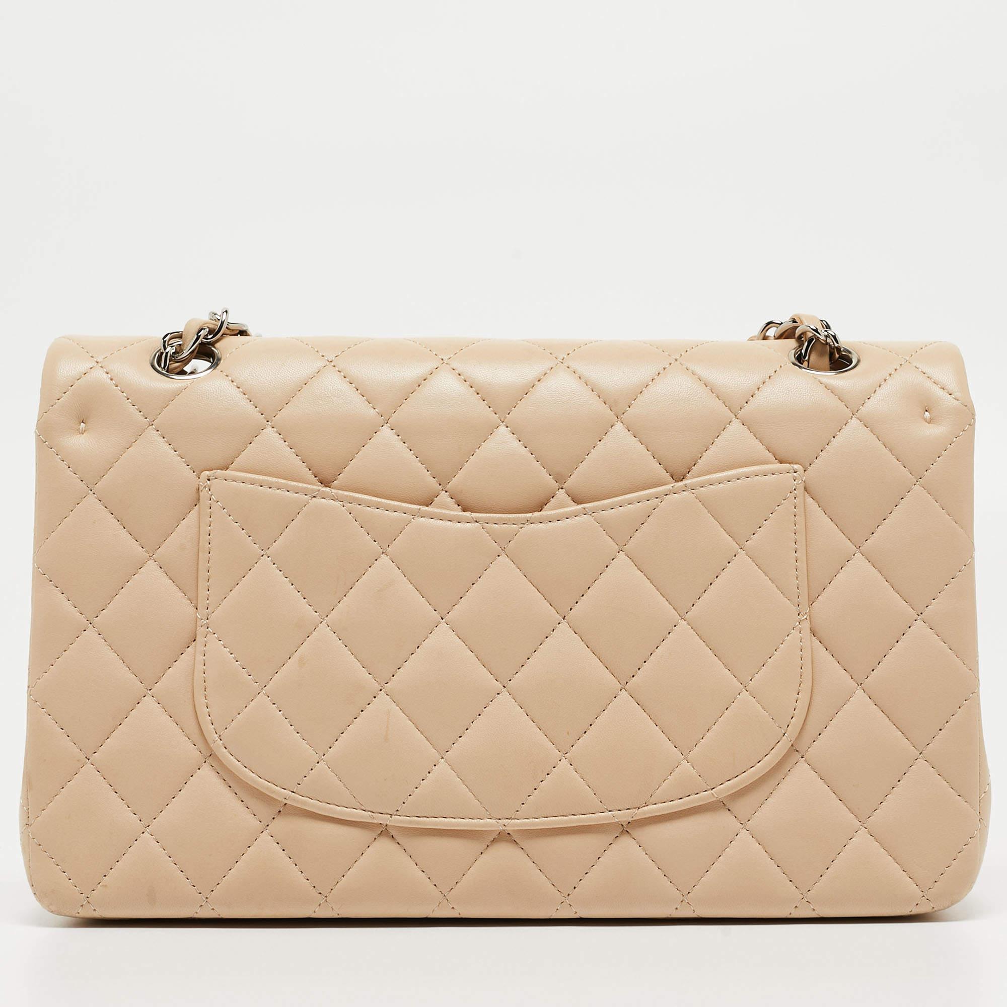 Indulge in timeless luxury with this Chanel Classic Double Flap bag. Meticulously handcrafted, this iconic piece combines heritage, elegance, and craftsmanship, elevating your style to a level of unmatched sophistication.

Includes: Original