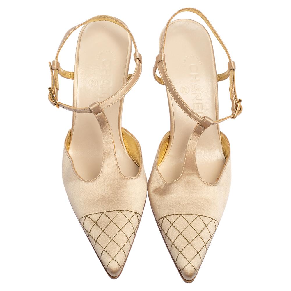 Your elegant feet deserve the best and what better than these sandals from Chanel. The beige sandals are crafted from satin and come with quilted cap toes, buckled ankle straps, and 9 cm quilted heels.

Includes: Original Dustbag
