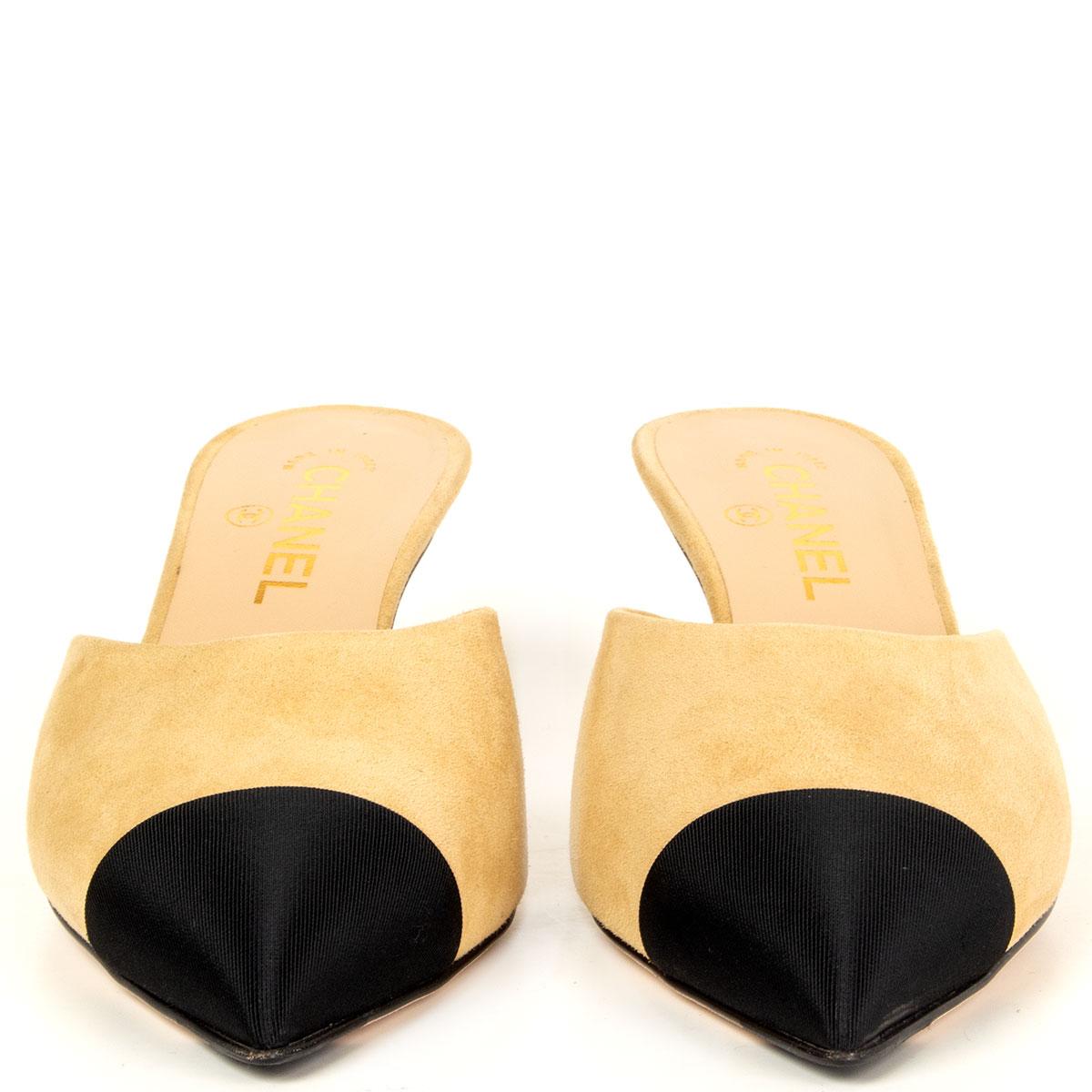 100% authentic Chanel pointed-toe kitten-heel mules in beige suede featuring a classic black grosgrain tip. Have been worn once inside and are in virtually new condition. Come with dust bag. 

Measurements
Imprinted Size	39C
Shoe Size	39
Inside