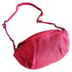 Chanel belt bag in red leather.