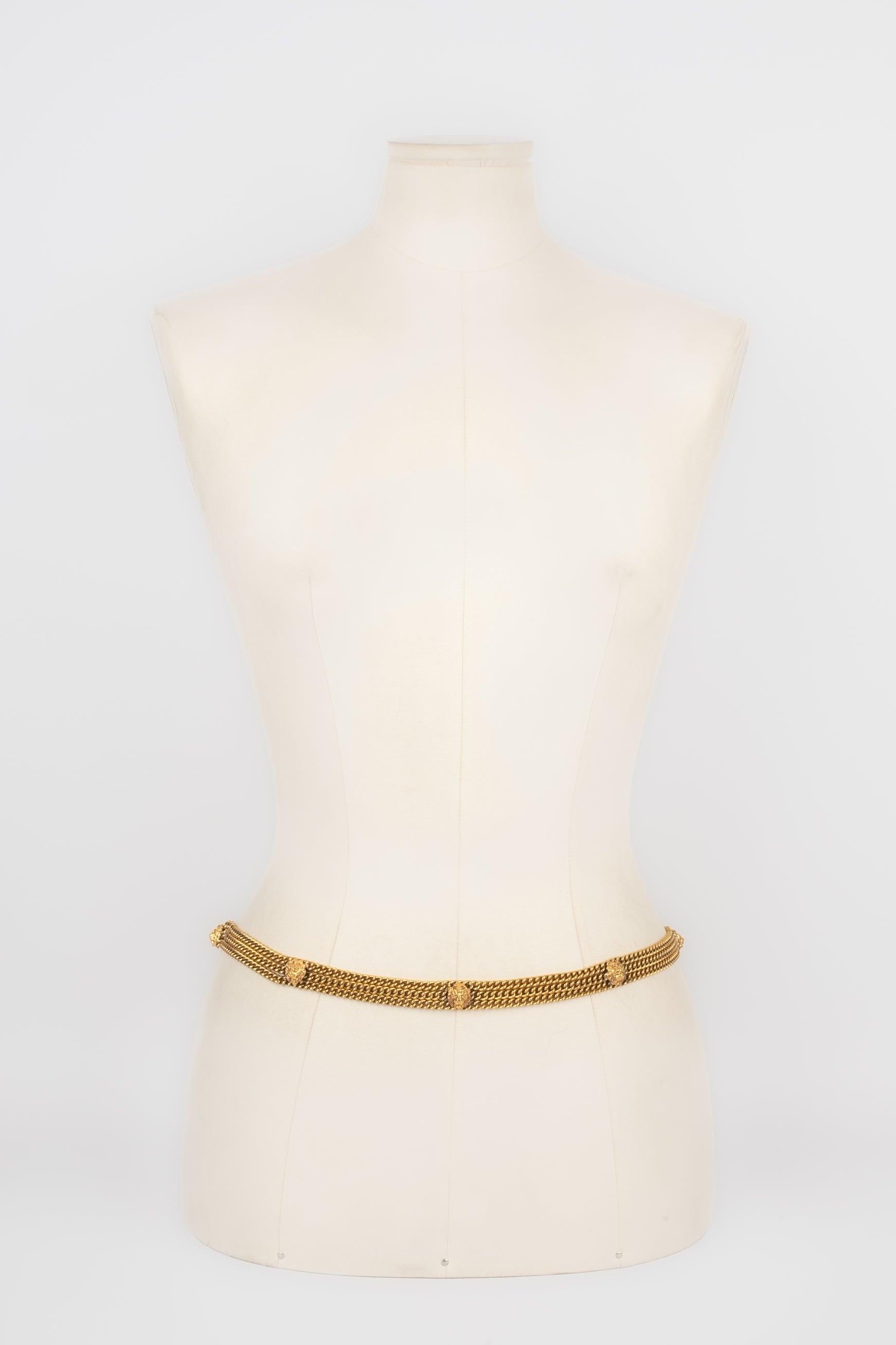 Chanel - (Made in France) Golden metal three-row belt decorated with a lion head. Haute Couture Collection from the Coco era.

Additional information:
Condition: Very good condition
Dimensions: Length: 75 cm

Seller Reference: CCB49