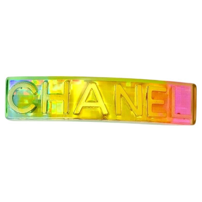 Super vibrant and fun vintage Chanel hair beret. This is the perfect accessory to pair with your Chanel earrings, Louis Vuitton necklace and Versace little black dress. The iridescent color scheme is so vivid, this is sure to add the pop of color to