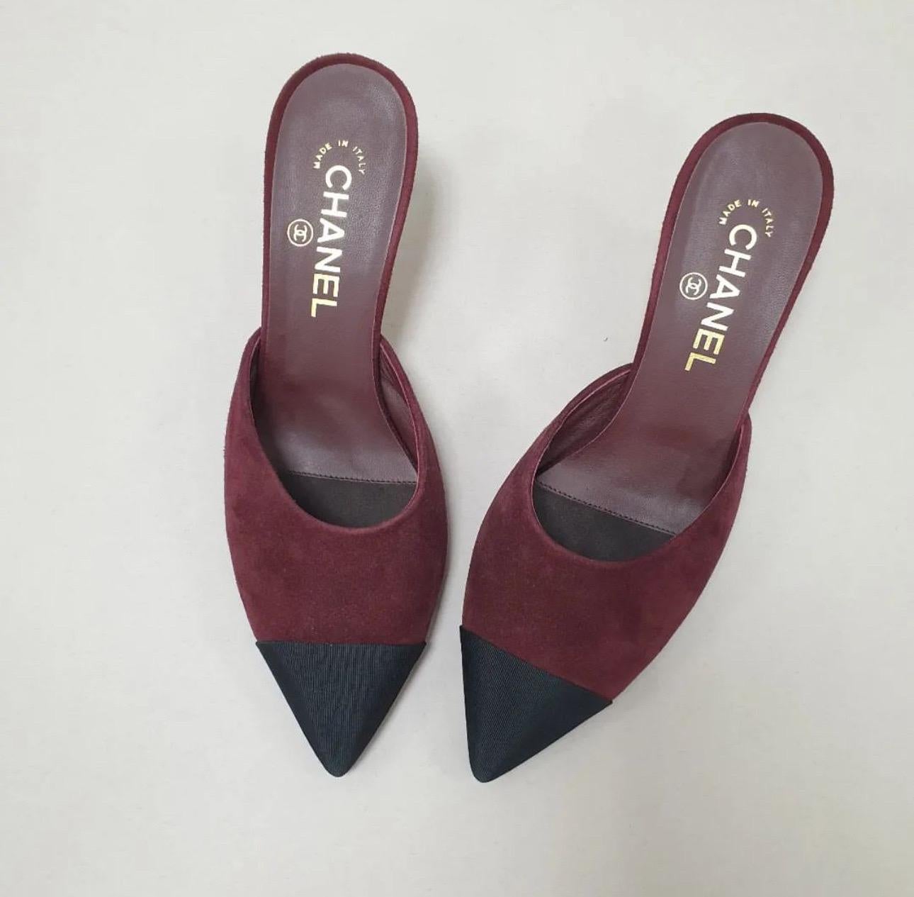 100% authentic Chanel pointed-toe kitten-heel mules in burbundy suede featuring a classic black grosgrain tip. Have been worn once inside and are in virtually new condition. 
No box. No dust bag.

Measurements
Imprinted Size 39C
Shoe Size 39
Inside