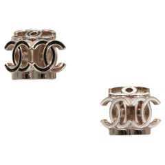Chanel bicolor studs
