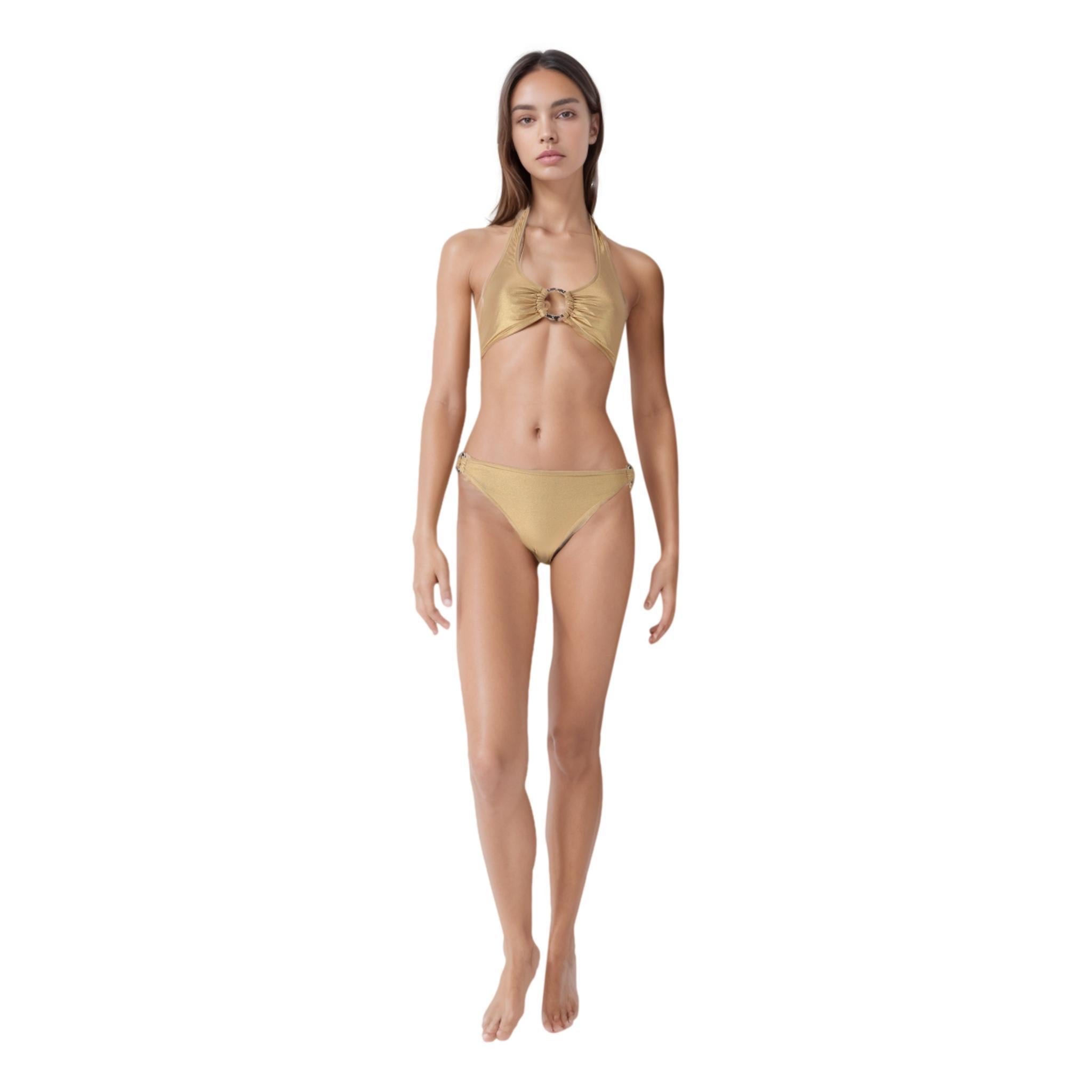 Brand New - Chanel Bikini Top & Bottom With Leather & Chain Detail

Metallic gold bikini top and bottom set designed with signature black leather and gold chain rings to the centre of the top and to the sides of the bottom.

Detailed with 'CC' logo