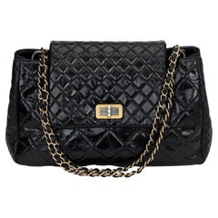 Chanel borsa nera con hardware a due toni